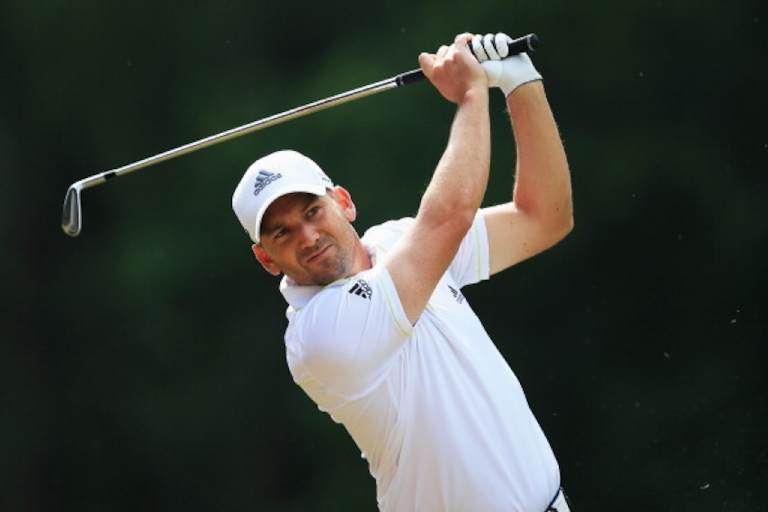 VIRGINIA WATER, ENGLAND - MAY 22:  Sergio Garcia of Spain hits his 2nd shot on the 6th hole during day one of the BMW PGA Championship at Wentworth on May 22, 2014 in Virginia Water, England.  (Photo by David Cannon/Getty Images)