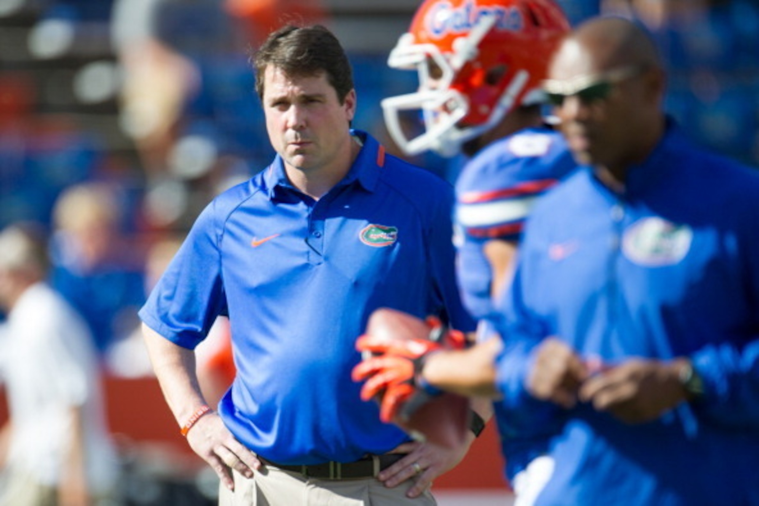 GAINESVILLE, FL - NOVEMBER 23:  Head coach Will Muschamp of the Florida Gators watches his team warm up before their game against the Georgia Southern Eagles on November 23, 2013 at Ben Hill Griffin Stadium in Gainesville, Florida. Georgia Southern defeat