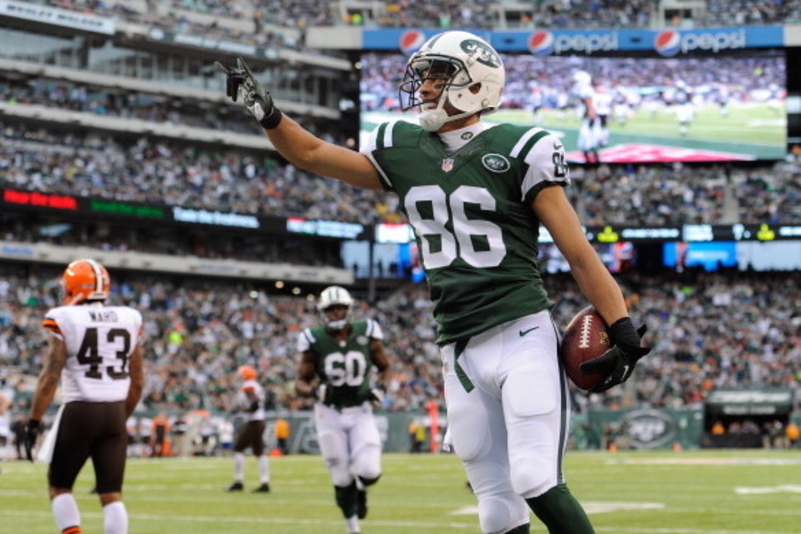 EAST RUTHERFORD, NJ - DECEMBER 22:  Wide receiver David Nelson #86 of the New York Jets celebrates after his touchdown catch against the Cleveland Browns at MetLife Stadium on December 22, 2013 in East Rutherford, New Jersey. (Photo by Ron Antonelli/Getty