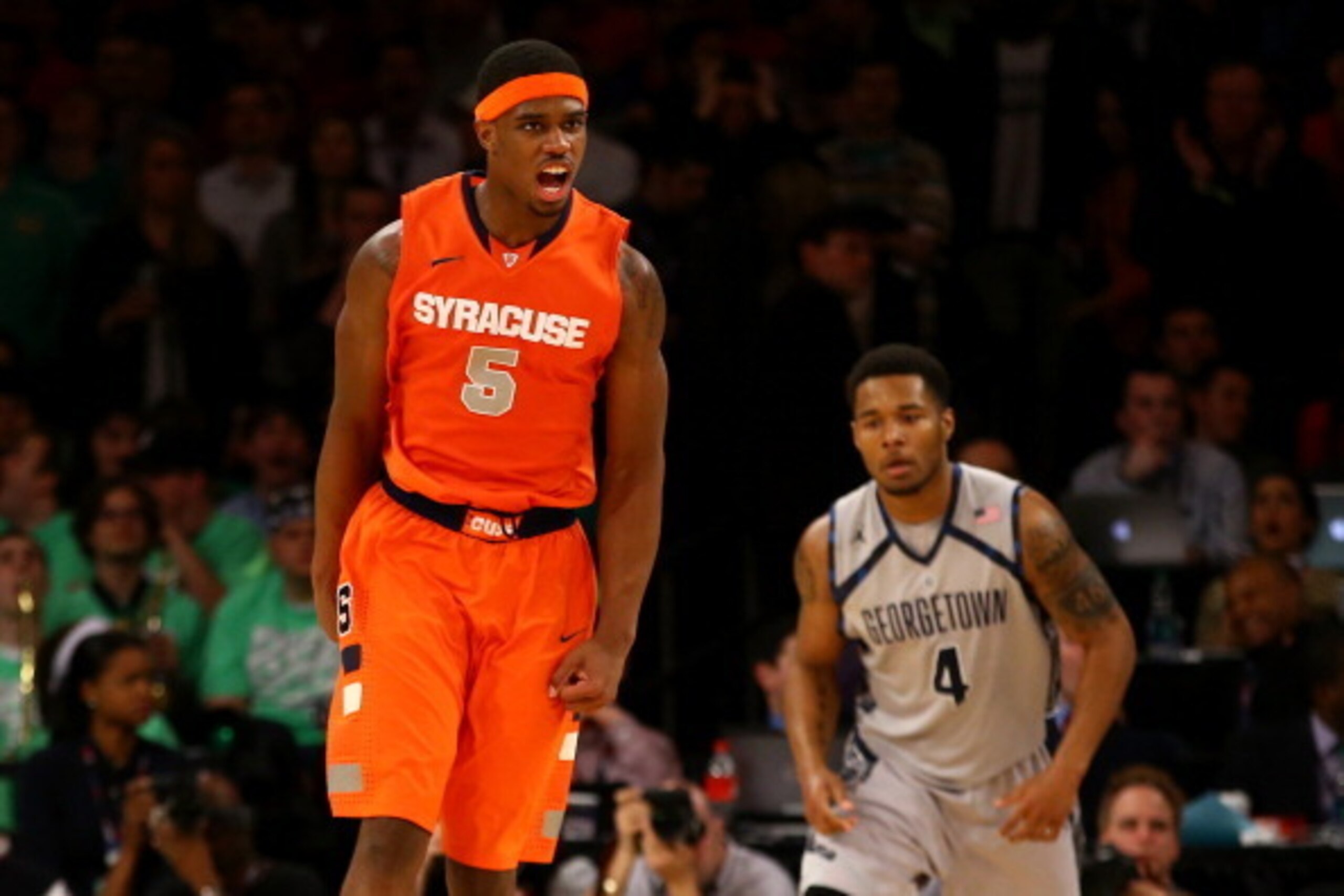 NEW YORK, NY - MARCH 15:  C.J. Fair #5 of the Syracuse Orange reacts after he dunked the ball against the Georgetown Hoyas during the semifinals of the Big East Men's Basketball Tournament at Madison Square Garden on March 15, 2013 in New York City.  (Pho