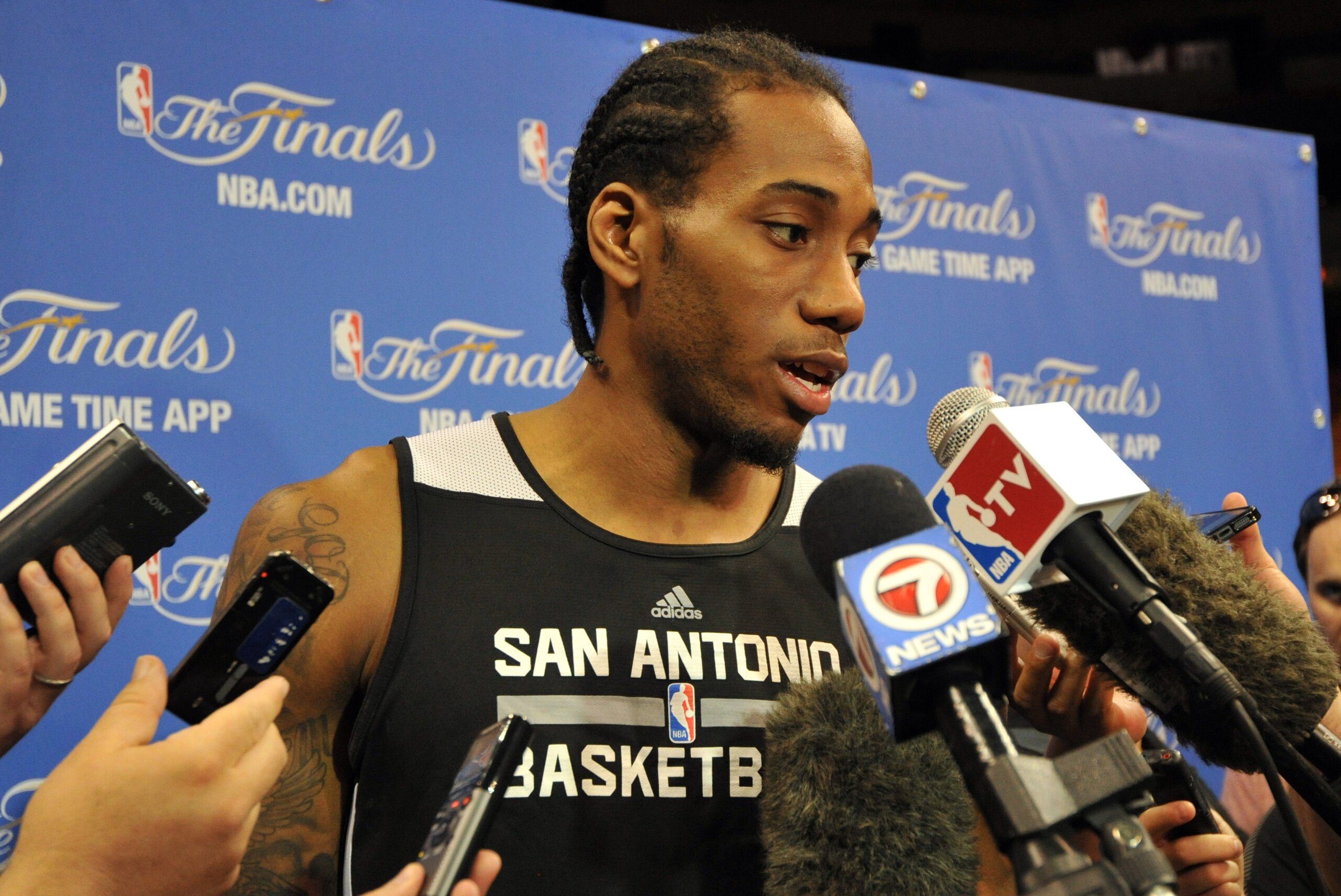 Jun 11, 2014; Miami, FL, USA; San Antonio Spurs forward Kawhi Leonard speaks to the media after practice before game four of the 2014 NBA Finals against the Miami Heat at American Airlines Arena. Mandatory Credit: Steve Mitchell-USA TODAY Sports