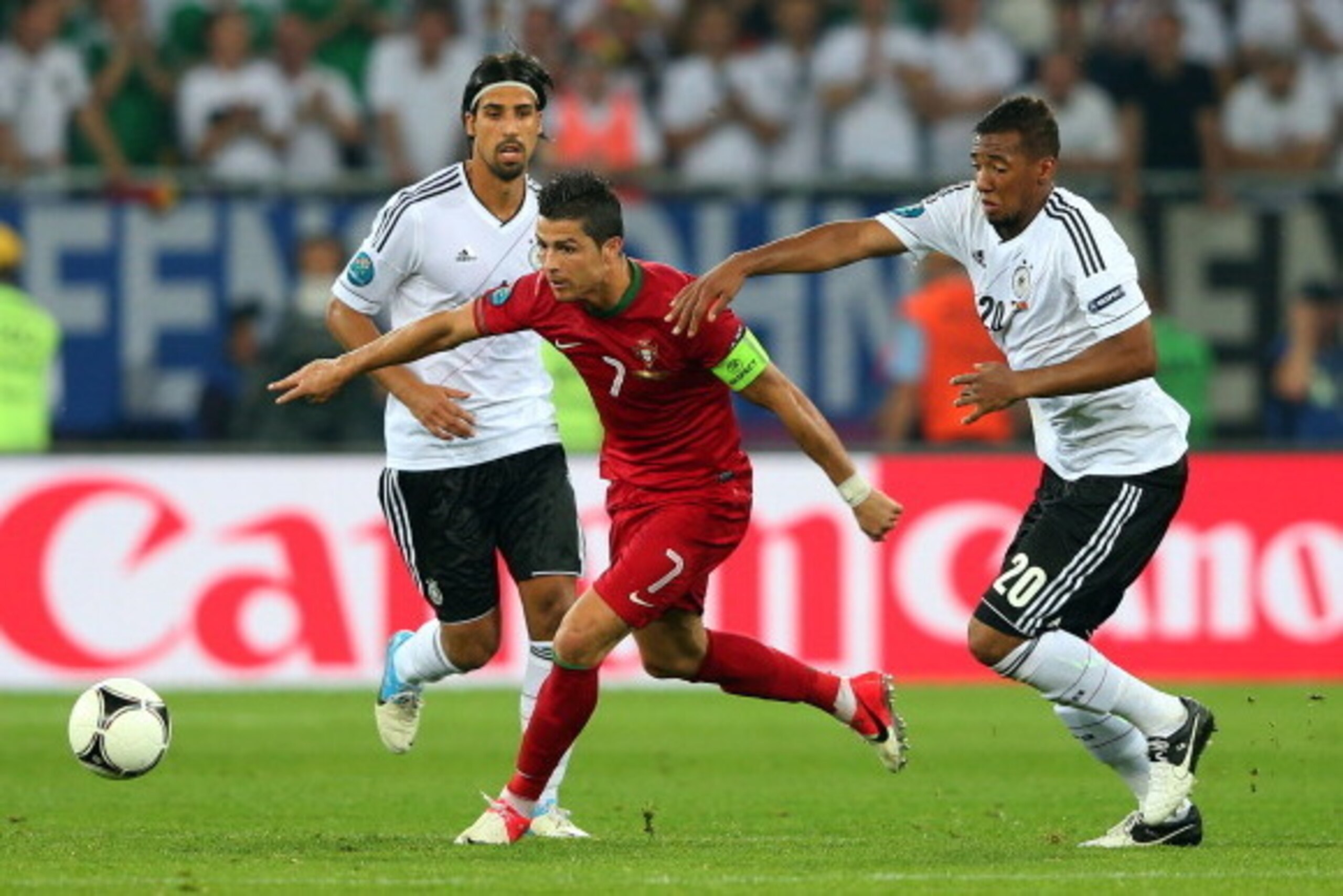 L'VIV, UKRAINE - JUNE 09:  Cristiano Ronaldo of Portugal and Jerome Boateng of Germany during the UEFA EURO 2012 group B match between Germany and Portugal at Arena Lviv on June 9, 2012 in L'viv, Ukraine.  (Photo by Alex Livesey/Getty Images)