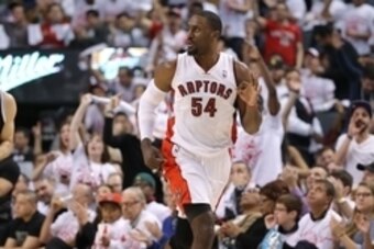 Apr 19, 2014; Toronto, Ontario, CAN; Toronto Raptors forward Patrick Patterson (54) reacts after hitting a three-pointer against the Brooklyn Nets in game one during the first round of the 2014 NBA Playoffs at Air Canada Centre. The Nets beat the Raptors