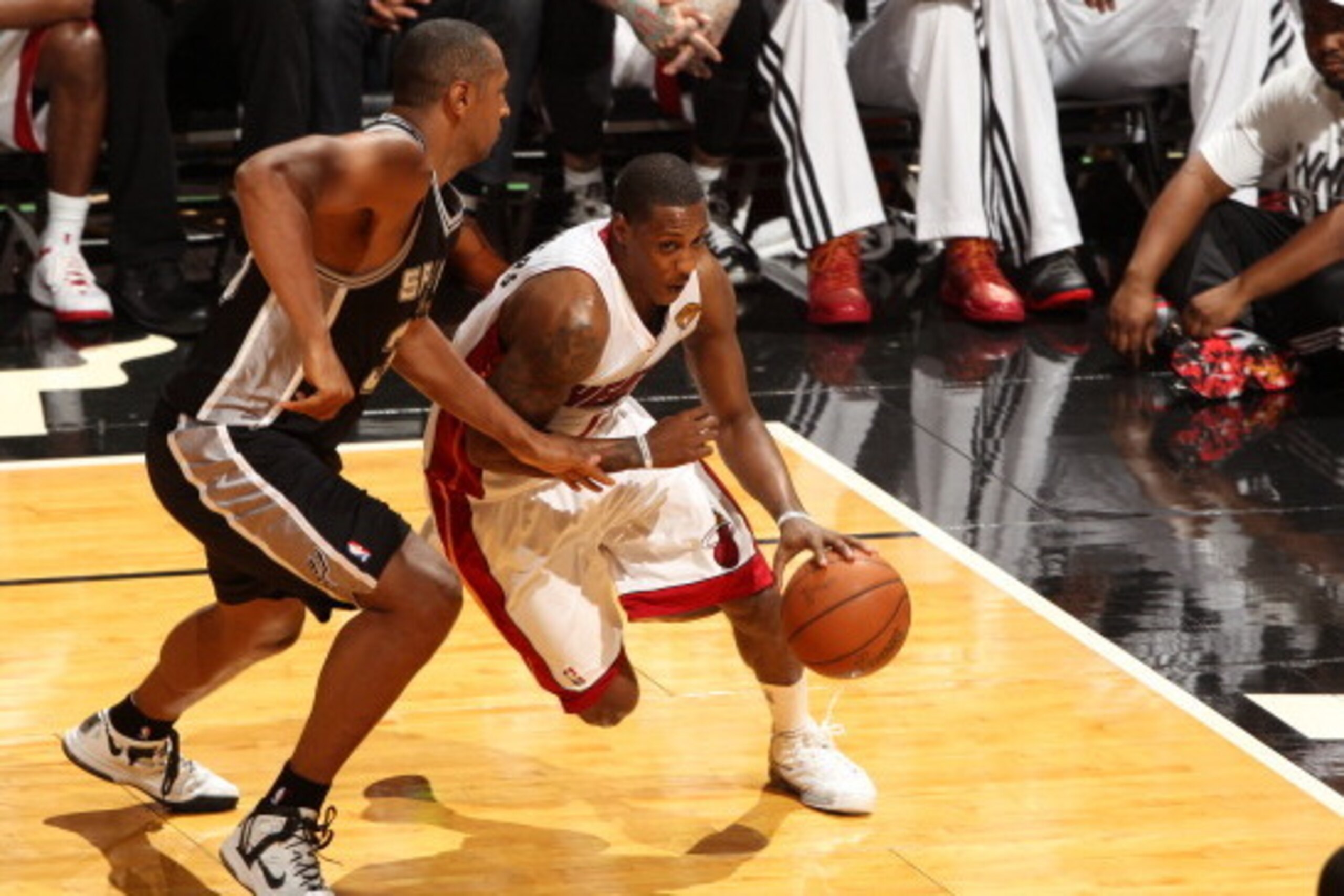 MIAMI, FL - JUNE 10:  Mario Chalmers #15 of the Miami Heat handles the ball against the San Antonio Spurs during Game Three of the 2014 NBA Finals at the American Airlines Arena in Miami, Florida on June 10, 2014. NOTE TO USER: User expressly acknowledges
