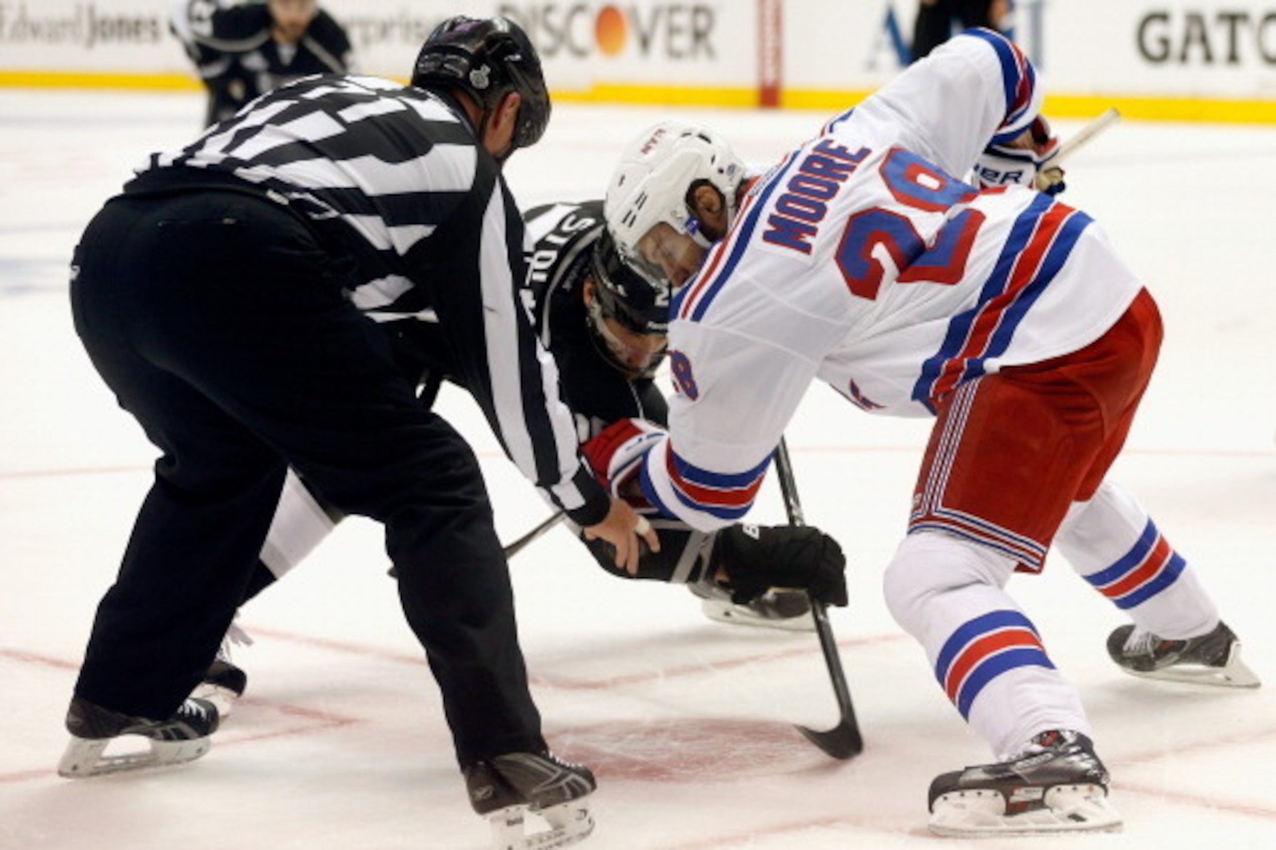LOS ANGELES, CA - JUNE 07: Dominic Moore #28 of the New York Rangers and Jarret Stoll #28 of the Los Angeles Kings face off in the second period of Game Two of the 2014 Stanley Cup Final at Staples Center on June 7, 2014 in Los Angeles, California.  (Phot