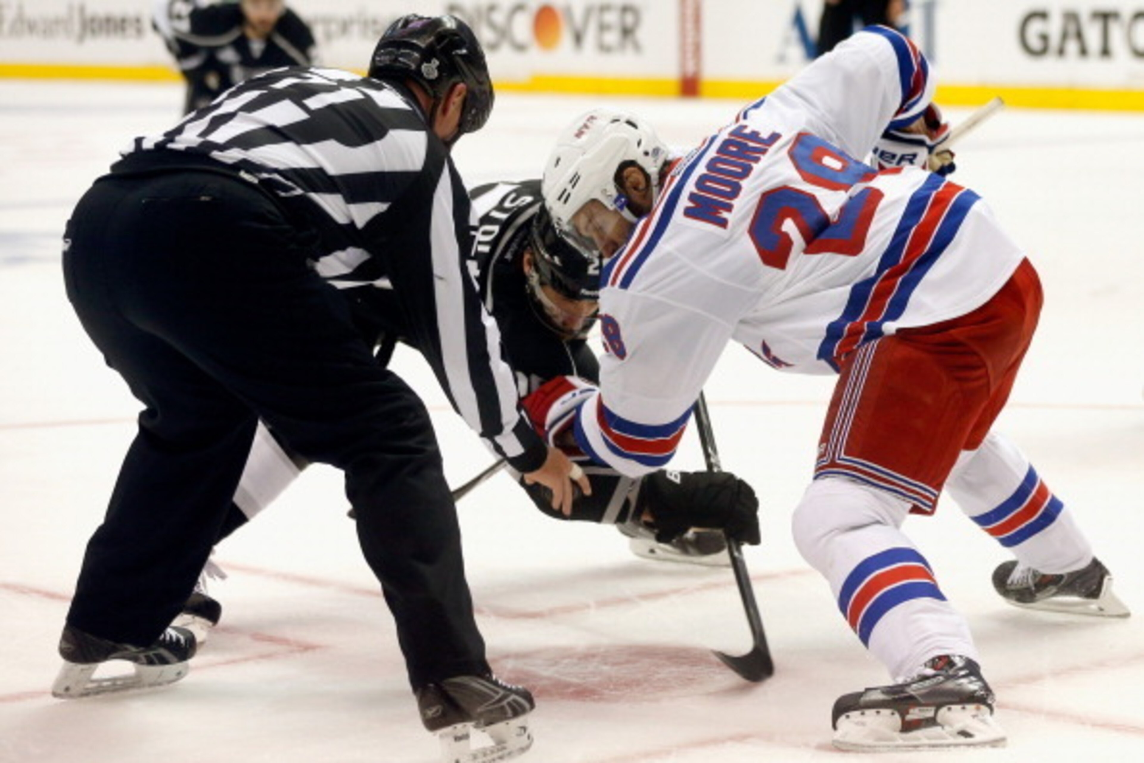 LOS ANGELES, CA - JUNE 07: Dominic Moore #28 of the New York Rangers and Jarret Stoll #28 of the Los Angeles Kings face off in the second period of Game Two of the 2014 Stanley Cup Final at Staples Center on June 7, 2014 in Los Angeles, California.  (Phot