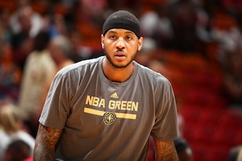 MIAMI, FL - APRIL 6: Carmelo Anthony #7 of the New York Knicks warms up on the court before the game against the Miami Heat on April 6, 2014 at American Airlines Arena in Miami, Florida.  NOTE TO USER: User expressly acknowledges and agrees that, by downl