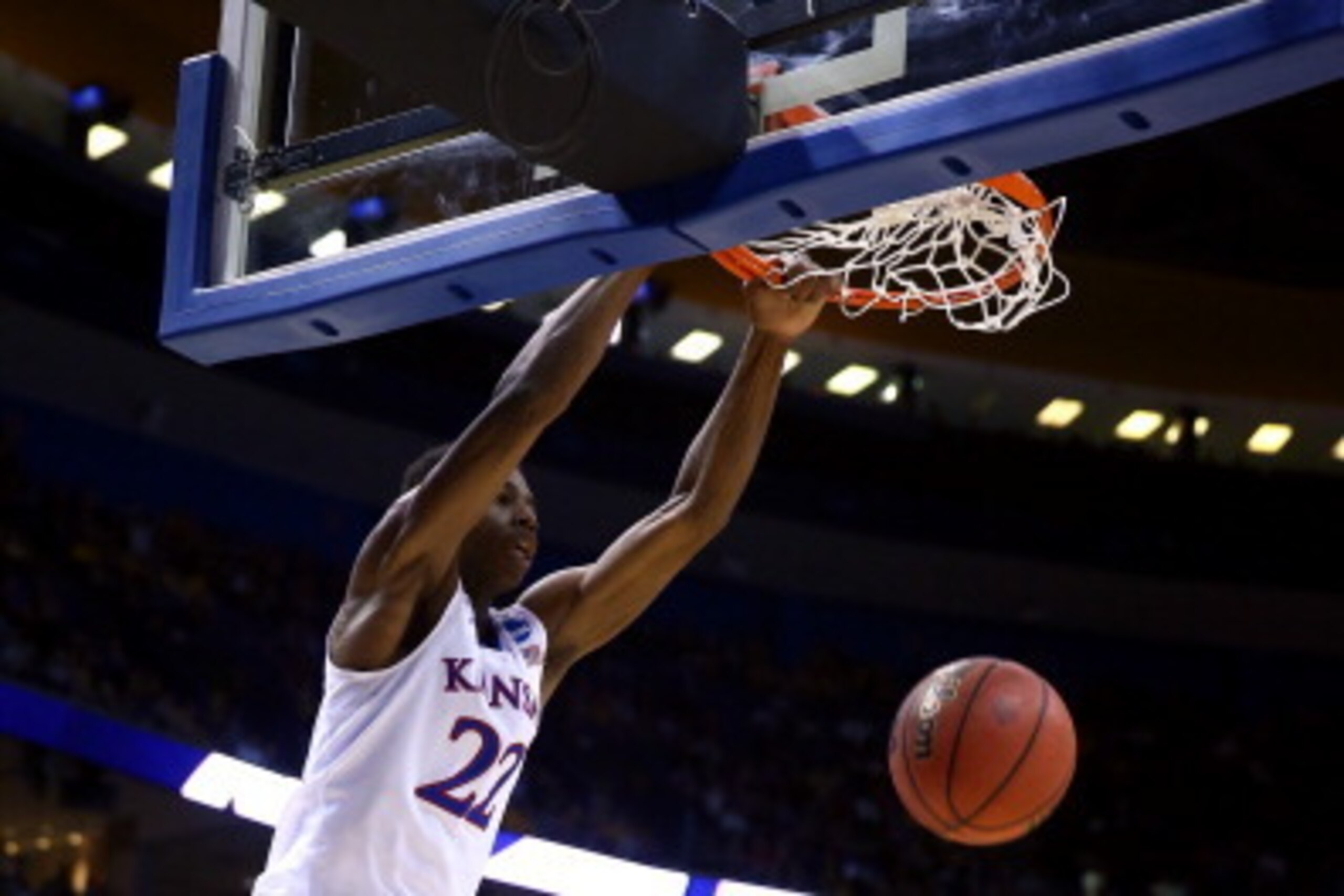 ST LOUIS, MO - MARCH 21:  Andrew Wiggins #22 of the Kansas Jayhawks dunks the ball against the Eastern Kentucky Colonels during the second round of the 2014 NCAA Men's Basketball Tournament at Scottrade Center on March 21, 2014 in St Louis, Missouri.  (Ph