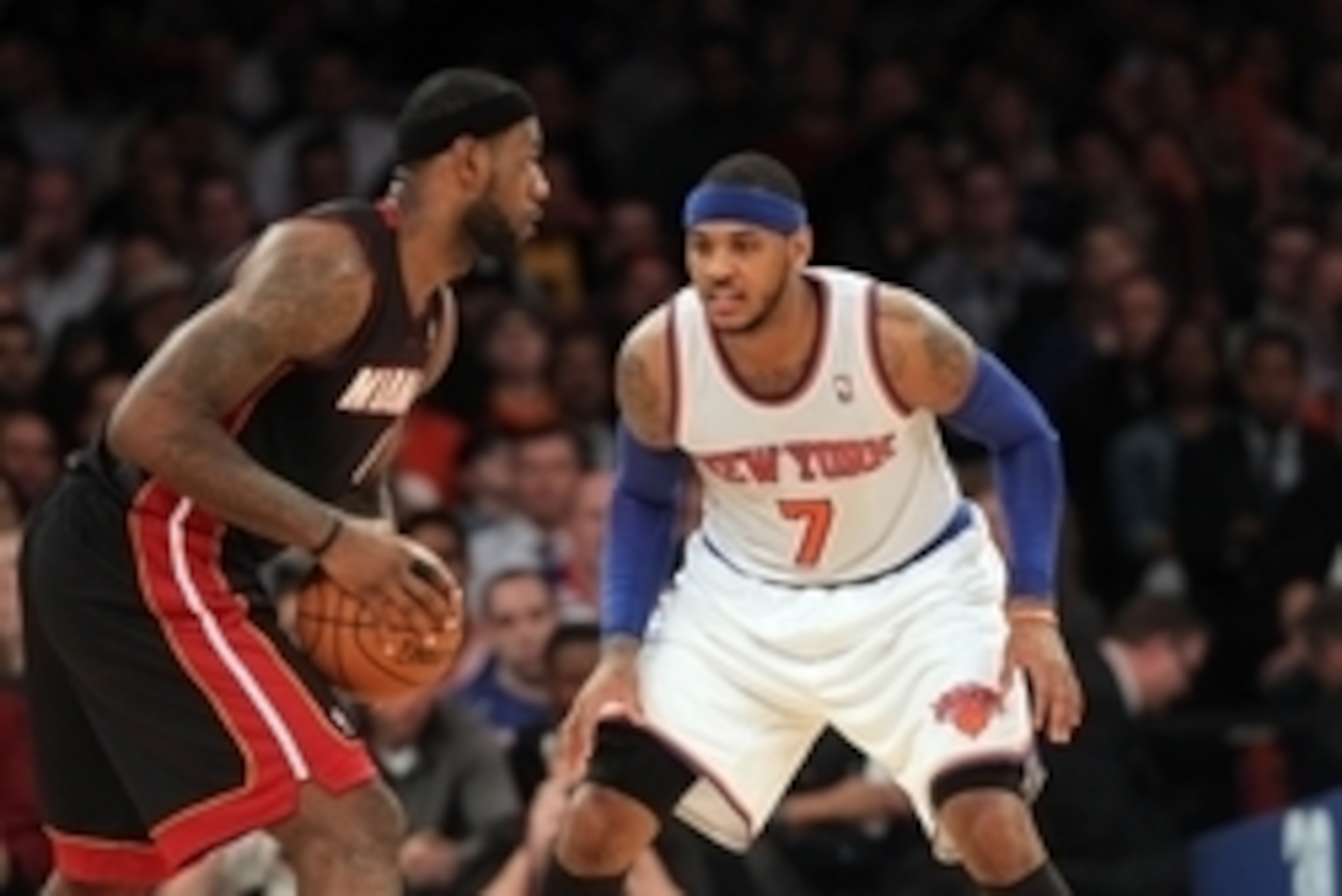 Jan 9, 2014; New York, NY, USA; New York Knicks small forward Carmelo Anthony (7) defends Miami Heat small forward LeBron James (6) during the fourth quarter of a game at Madison Square Garden. Mandatory Credit: Brad Penner-USA TODAY Sports