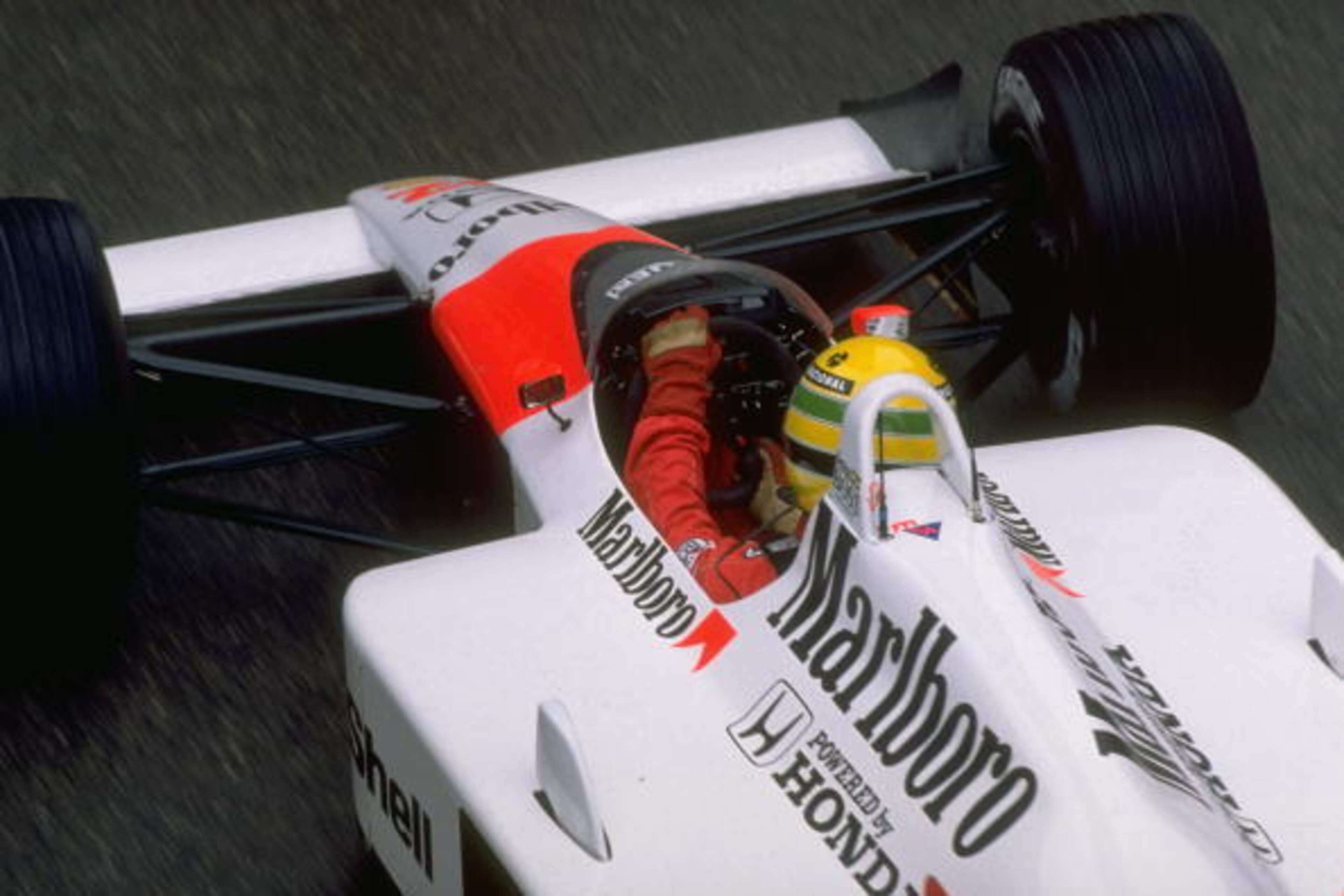 1988:  Rear view of Ayrton Senna of Brazil in his McLaren Honda before the Monaco Grand Prix at the Monte Carlo circuit in Monaco. Senna retired from the race after hitting a barrier. \ Mandatory Credit: Allsport UK /Allsport