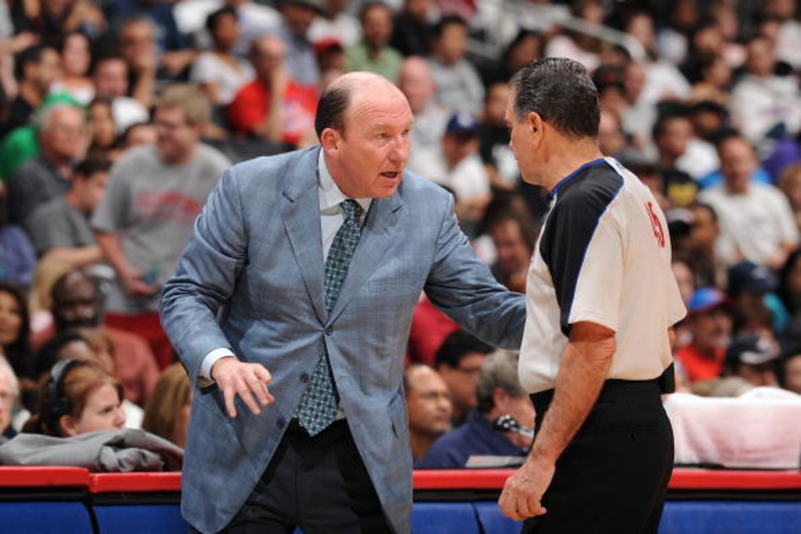 LOS ANGELES, CA - JANUARY 10:  Head coach Mike Dunleavy of the Los Angeles Clippers talks with referee Joe Forte #45 during the game against the Miami Heat on January 10, 2010 at Staples Center in Los Angeles, California. The Clippers won 94-84. NOTE TO U