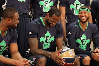 NEW ORLEANS, LA - FEBRUARY 16: LeBron James #6, Dwayne Wade #3, and Carmelo Anthony #7 of the Eastern Conference All-Stars laugh before the 2014 NBA All-Star Game at Smoothie King Center on February 16, 2014 in New Orleans, Louisiana. NOTE TO USER: User e