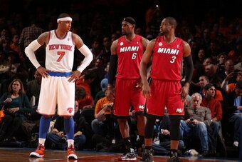 NEW YORK, NY - MARCH  3: Carmelo Anthony #7 of the New York Knicks stands with LeBron James #6 and Dwyane Wade #3 of the Miami Heat on March 3, 2013 at Madison Square Garden in New York City.  NOTE TO USER: User expressly acknowledges and agrees that, by 