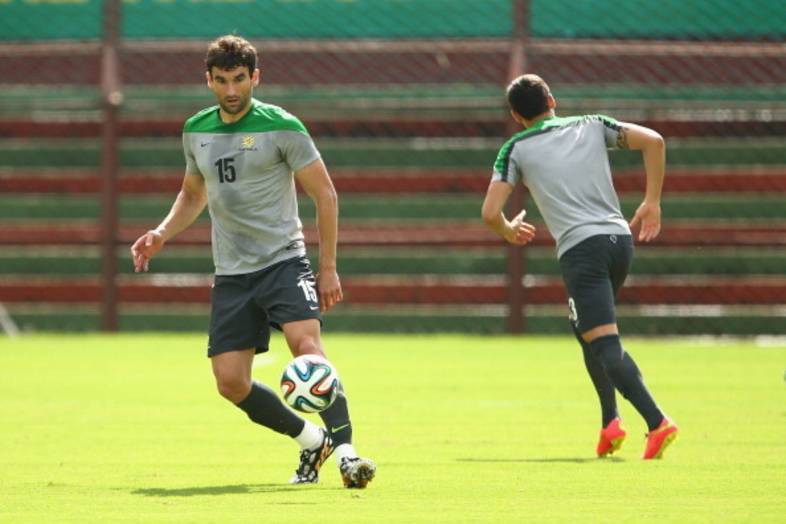 VITORIA, BRAZIL - JUNE 11: Socceroos captain Mile Jedinak passes during an Australian Socceroos training session at Arena Unimed Sicoob on June 11, 2014 in Vitoria, Brazil.  (Photo by Cameron Spencer/Getty Images)