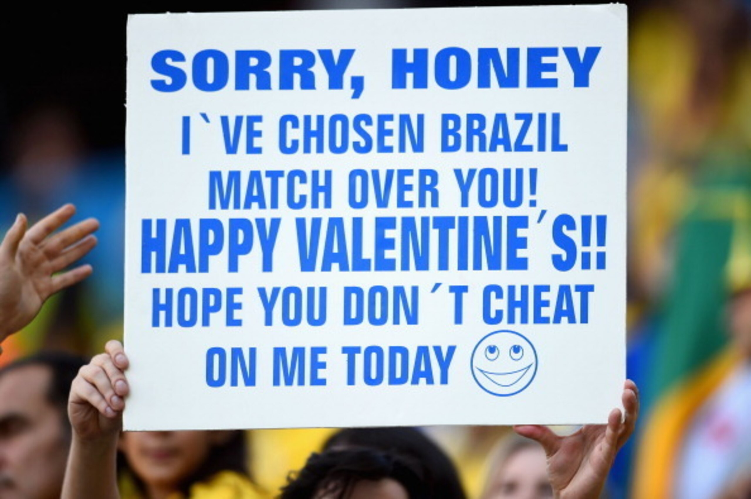 SAO PAULO, BRAZIL - JUNE 12: A fan holds up a sign before the Opening Ceremony of the 2014 FIFA World Cup Brazil prior to the Group A match between Brazil and Croatia at Arena de Sao Paulo on June 12, 2014 in Sao Paulo, Brazil.  (Photo by Christopher Lee/