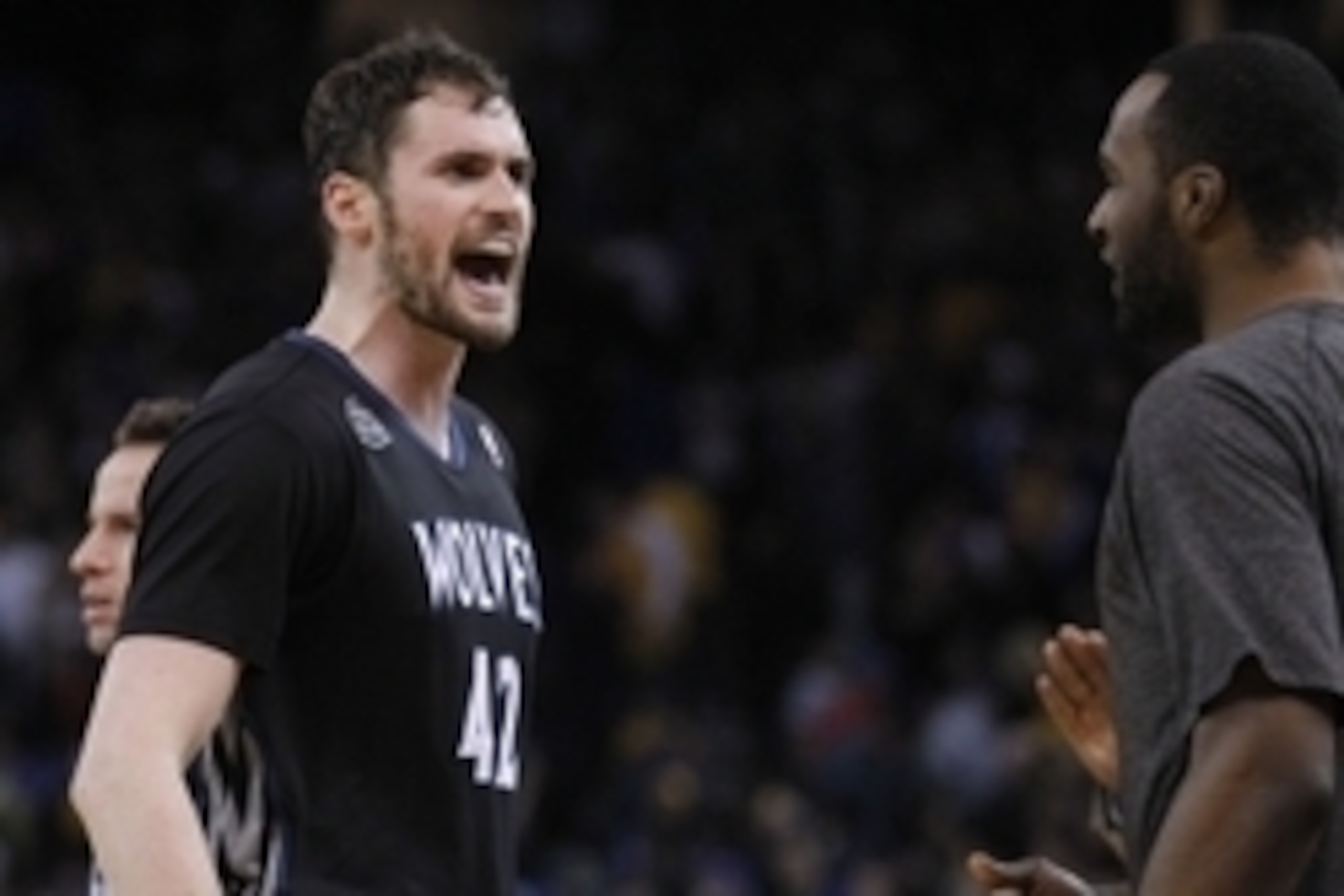 Jan 24, 2014; Oakland, CA, USA; Minnesota Timberwolves forward Kevin Love (42) reacts after the Timberwolves defeated the Golden State Warriors 121-120 at Oracle Arena. Mandatory Credit: Cary Edmondson-USA TODAY Sports