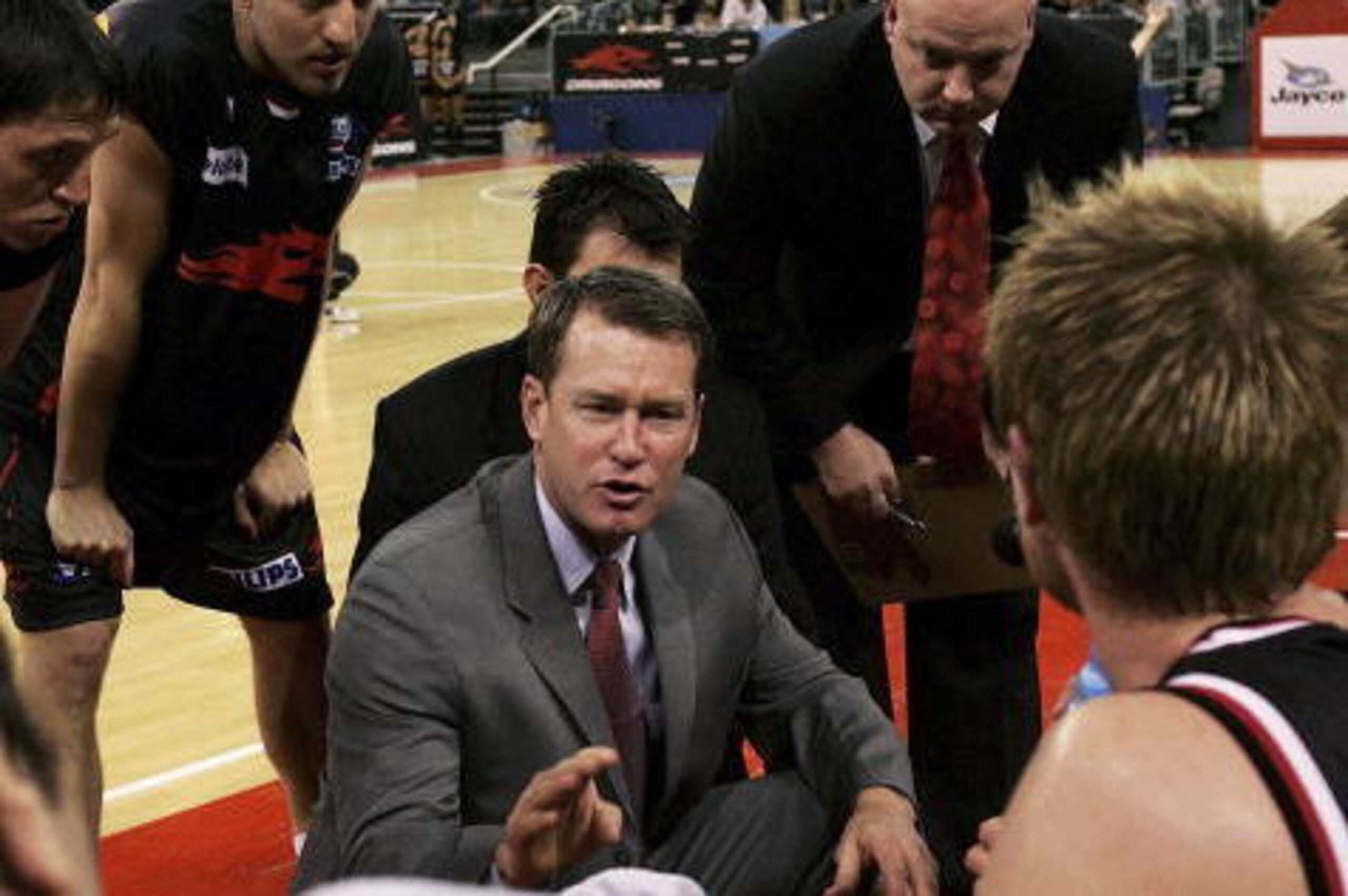 MELBOURNE, AUSTRALIA - OCTOBER 14:  Mark Price the coach of the Dragons talks to his players during the round four NBL game between the South Dragons and the Wollongong Hawks at Vodafone Arena on October 14, 2006 in Melbourne, Australia.  (Photo by Quinn 
