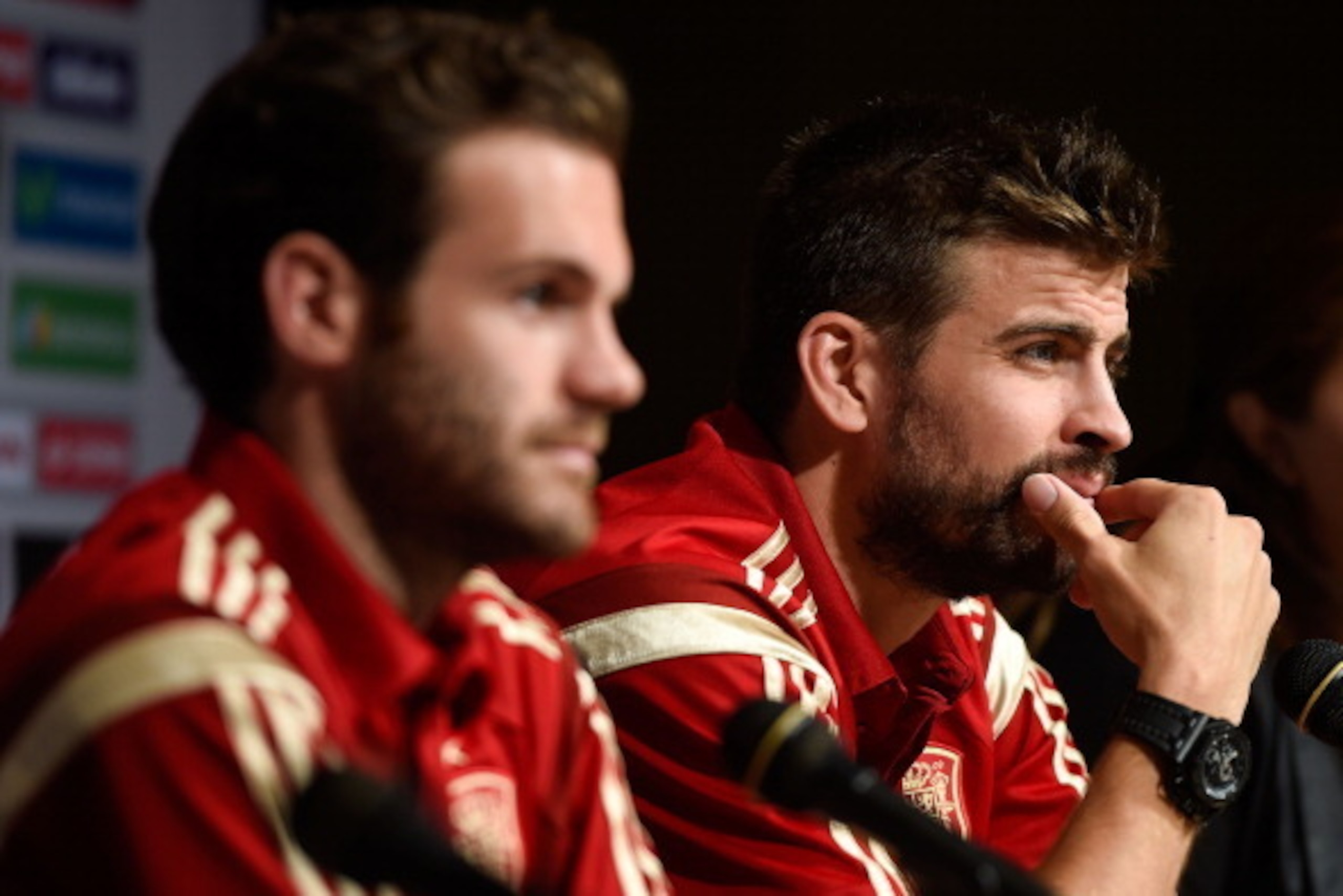 WASHINGTON, DC - JUNE 04:  Juan Mata and Gerard Pique of Spain face the media during a press conference at the Mandarin Hotel on June 4, 2014 in Washington, DC.  (Photo by David Ramos/Getty Images)