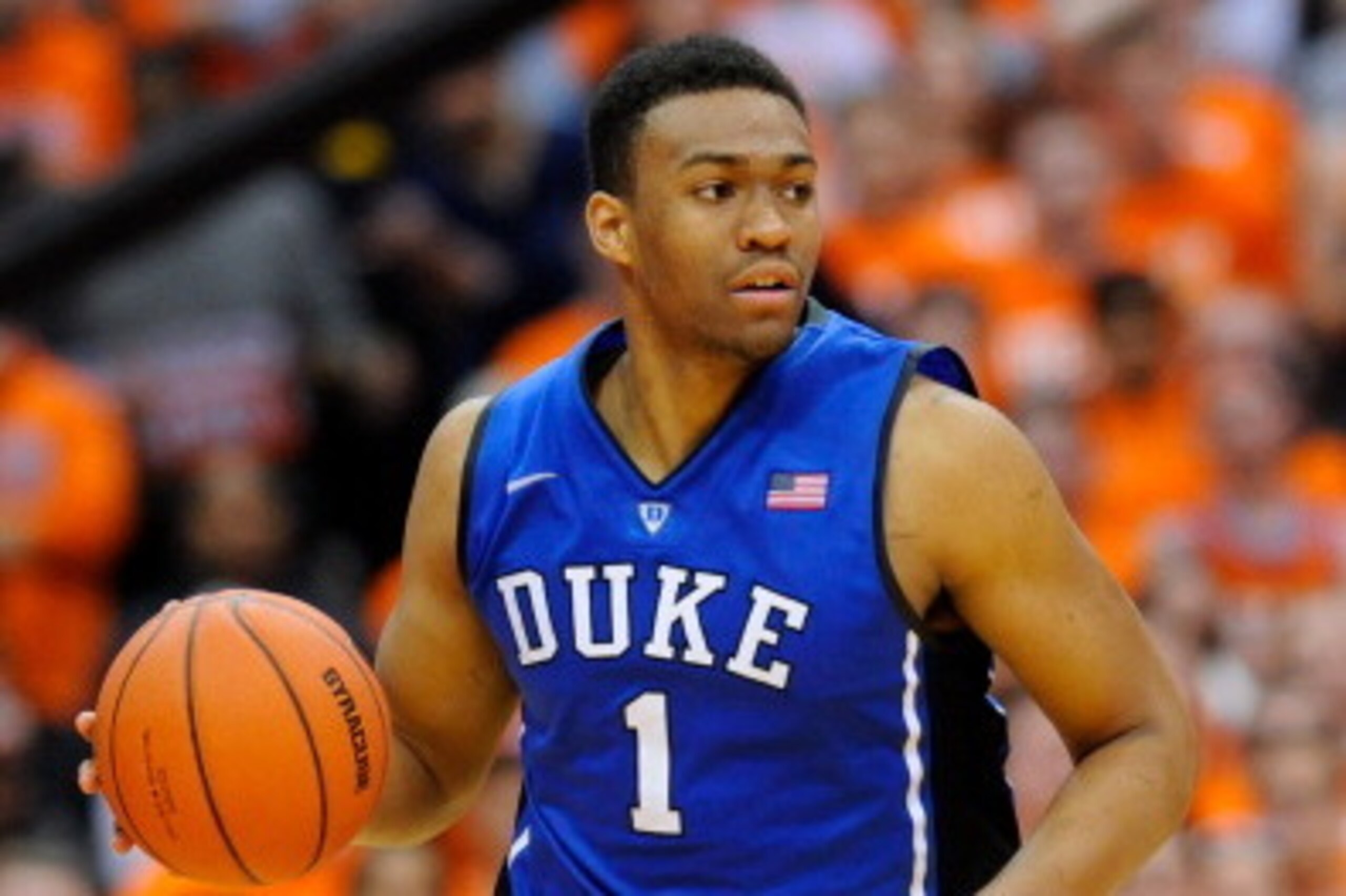 SYRACUSE, NY - FEBRUARY 01:  Jabari Parker #1 of the Duke Blue Devils dribbles the ball up the court against the Syracuse Orange during the second half at the Carrier Dome on February 1, 2014 in Syracuse, New York.  Syracuse defeated Duke 91-89 in overtim