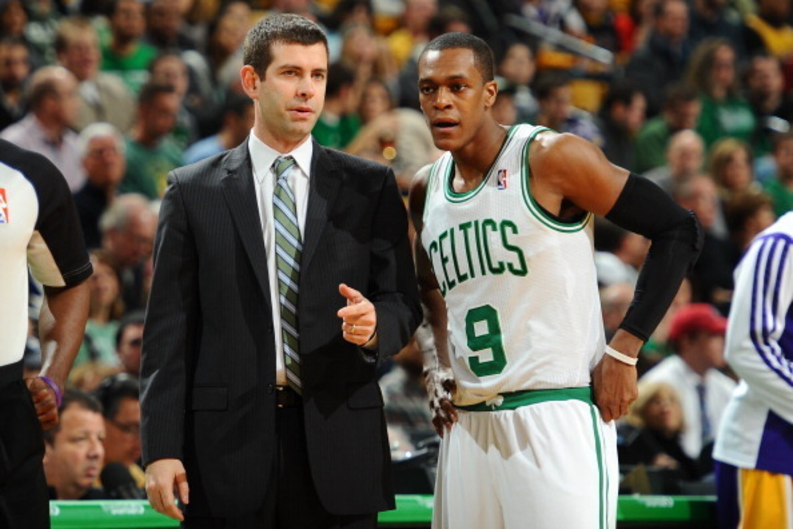 BOSTON, MA - JANUARY 17: Head coach Brad Stevens and Rajon Rondo #9 of the Boston Celtics talkd uring a time out against the Los Angeles Lakers on January 17, 2014 at the TD Garden in Boston, Massachusetts.  NOTE TO USER: User expressly acknowledges and a