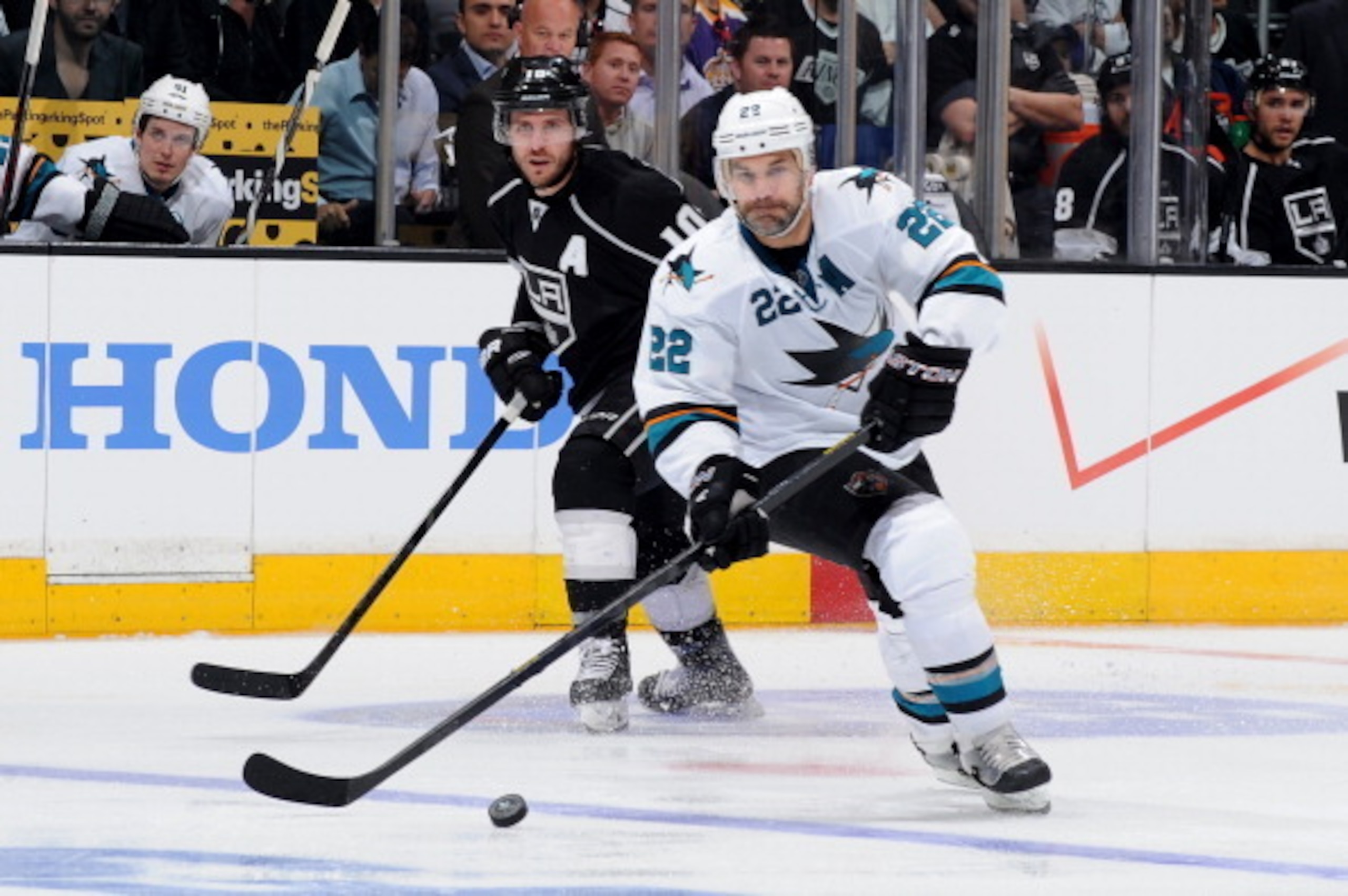 LOS ANGELES, CA - APRIL 28:  Dan Boyle #22 of the San Jose Sharks skates with the puck against the Los Angeles Kings in Game Six of the First Round of the 2014 Stanley Cup Playoffs at Staples Center on April 28, 2014 in Los Angeles, California. (Photo by 