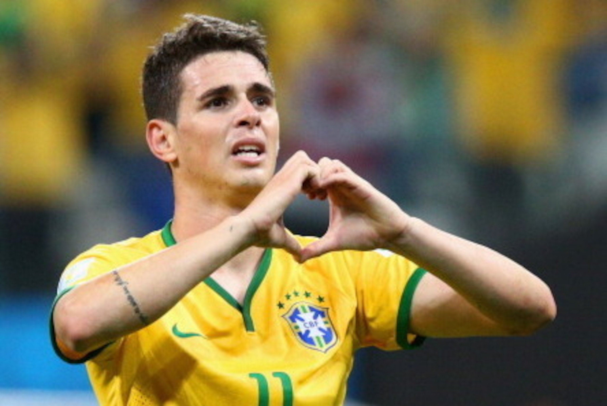 SAO PAULO, BRAZIL - JUNE 12:  Oscar of Brazil celebrates his goal in the second half during the 2014 FIFA World Cup Brazil Group A match between Brazil and Croatia at Arena de Sao Paulo on June 12, 2014 in Sao Paulo, Brazil.  (Photo by Adam Pretty/Getty I