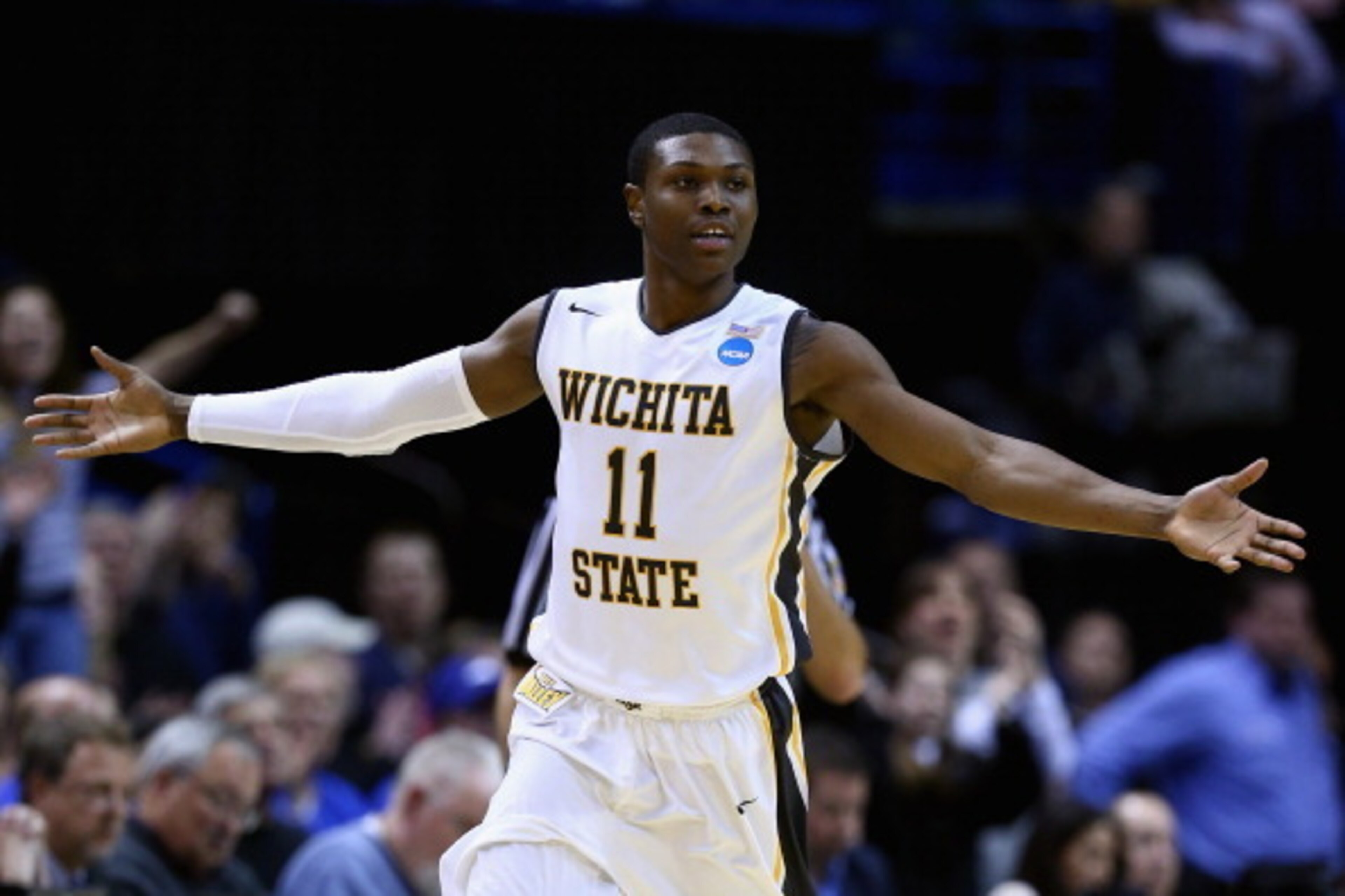 ST LOUIS, MO - MARCH 23:  Cleanthony Early #11 of the Wichita State Shockers celebrates after a basket in the second half against the Kentucky Wildcats during the third round of the 2014 NCAA Men's Basketball Tournament at Scottrade Center on March 23, 20