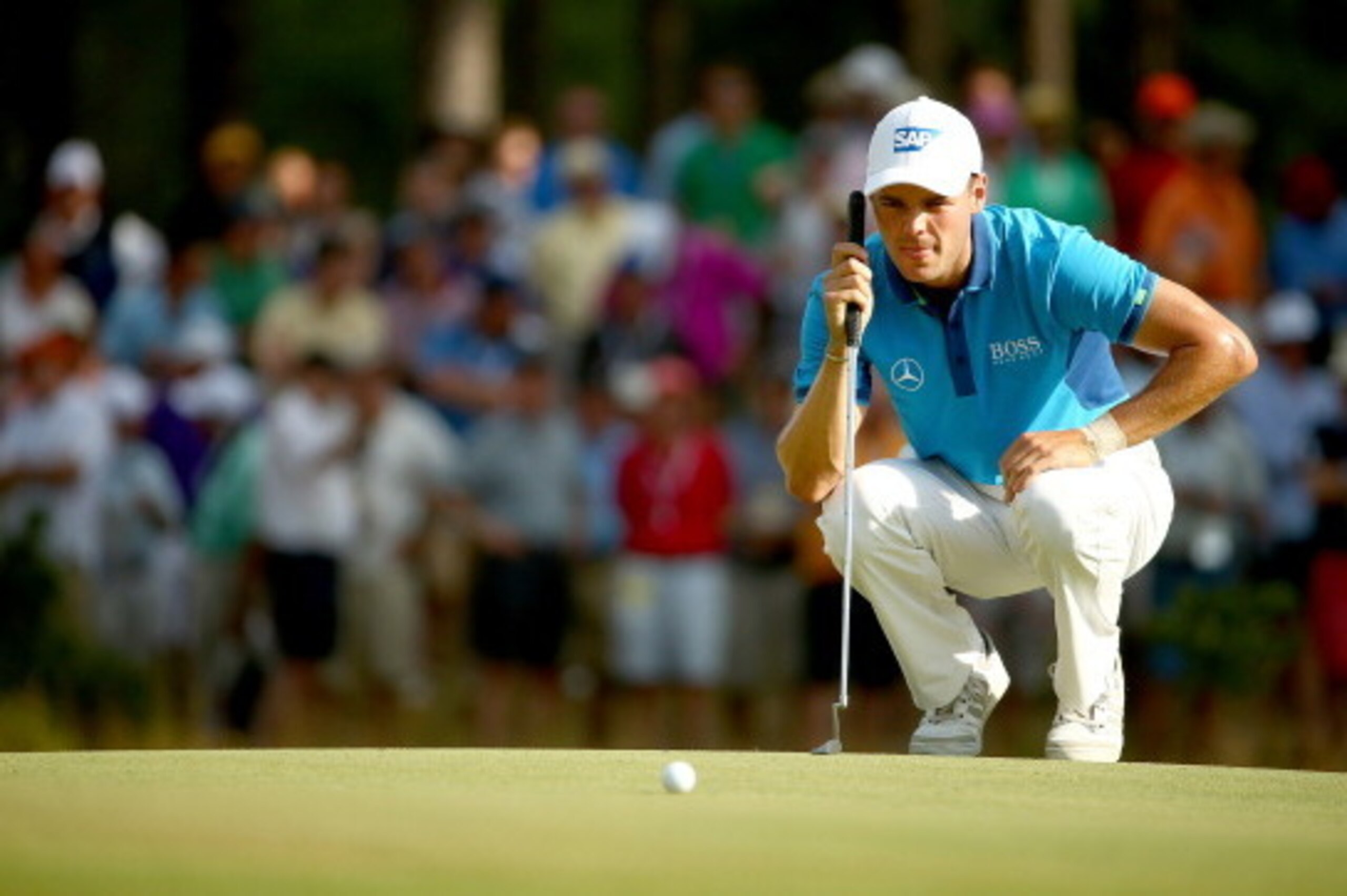 PINEHURST, NC - JUNE 12:  Martin Kaymer of Germany lines up a putt during the first round of the 114th U.S. Open at Pinehurst Resort & Country Club, Course No. 2 on June 12, 2014 in Pinehurst, North Carolina.  (Photo by Streeter Lecka/Getty Images)