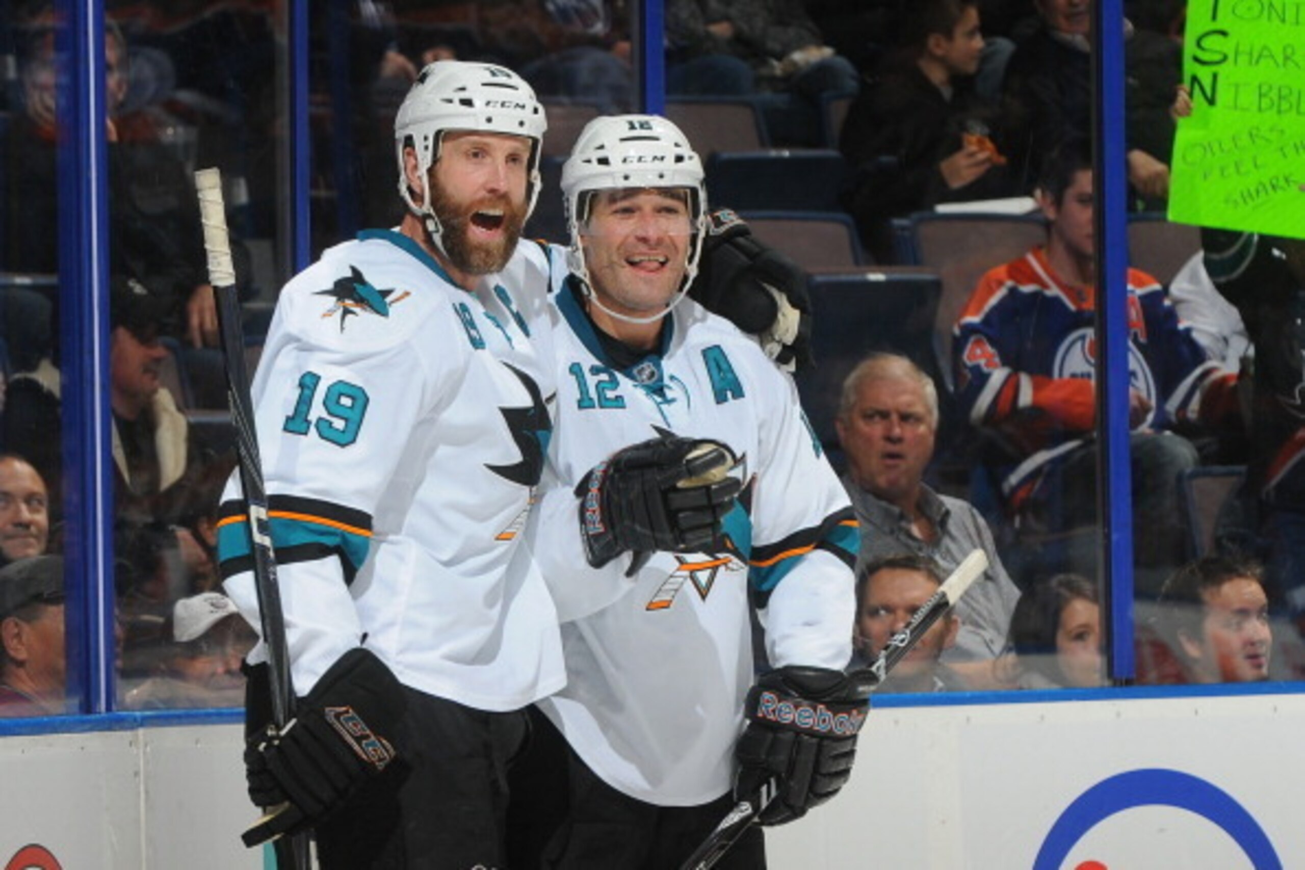 EDMONTON, AB - NOVEMBER 15:  Joe Thornton #19 and Patrick Marleau #12 of the San Jose Sharks celebrate after a goal in a game against Edmonton Oilers on November 15, 2013 at Rexall Place in Edmonton, Alberta, Canada. (Photo by Andy Devlin/NHLI via Getty I
