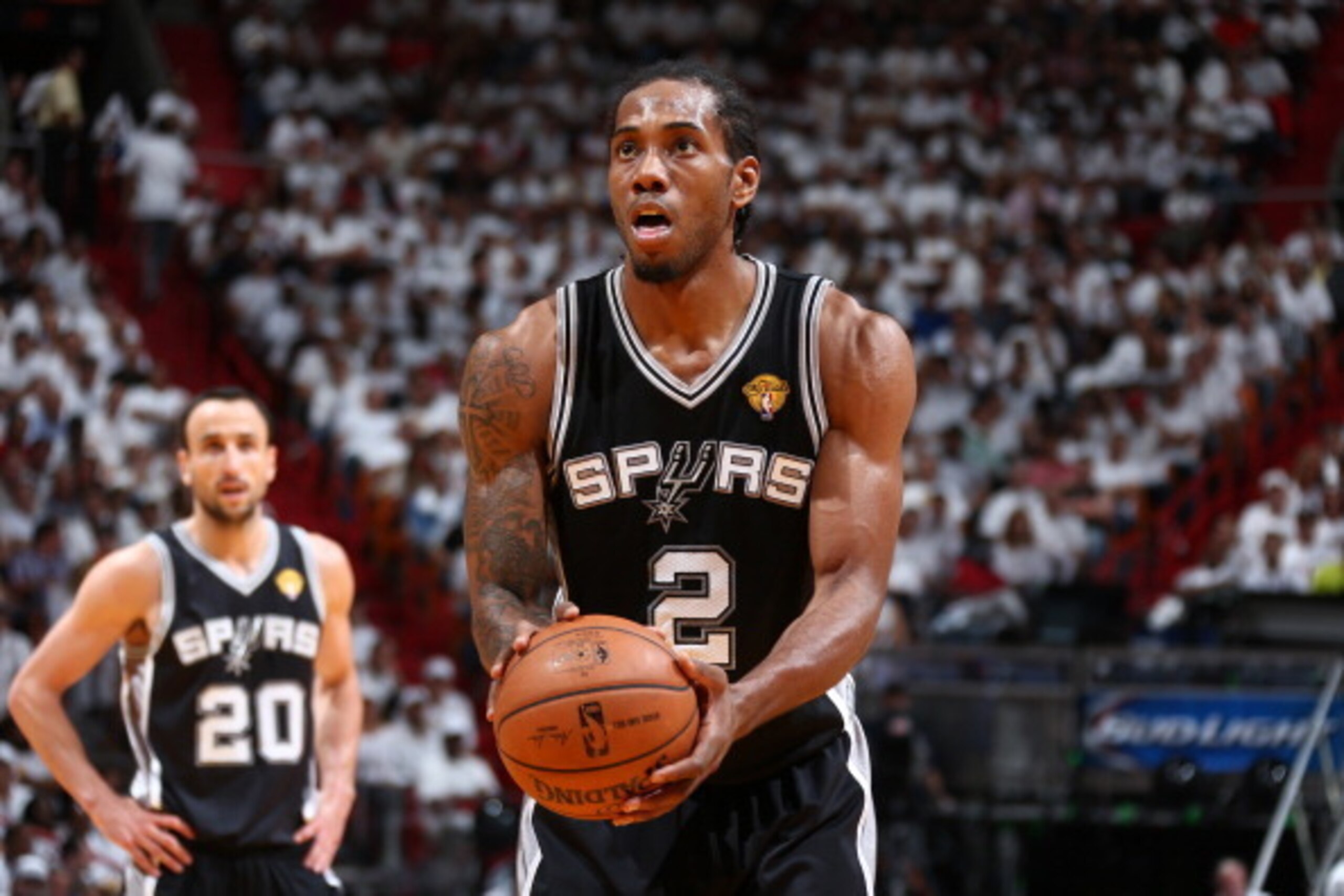 MIAMI, FL - JUNE 12: Kawhi Leonard #2 of the San Antonio Spurs shoots a foul shot against the Miami Heat during Game Four of the 2014 NBA Finals at American Airlines Arena in Miami, Florida on June 12, 2014.  NOTE TO USER: User expressly acknowledges and 