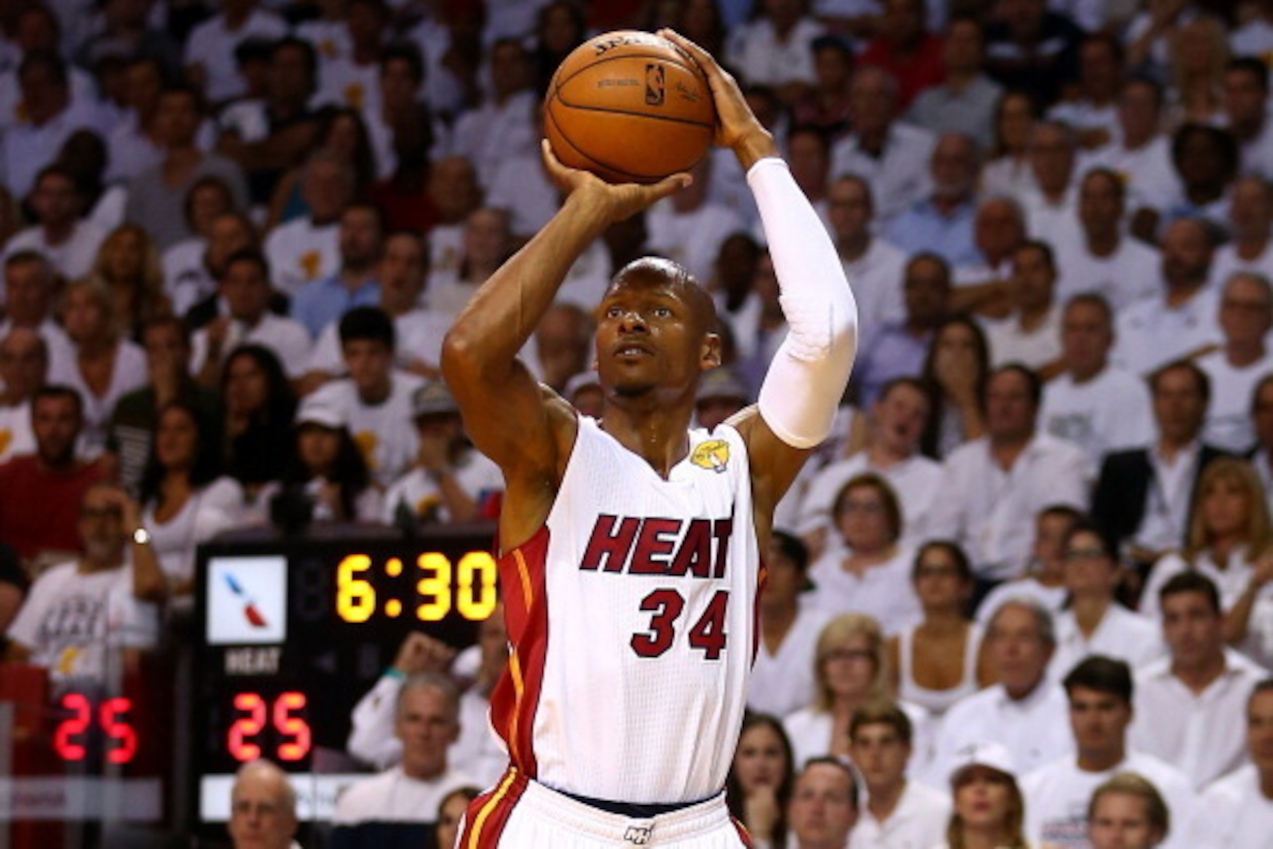 MIAMI, FL - JUNE 12:  Ray Allen #34 of the Miami Heat takes a shot against the San Antonio Spurs during Game Four of the 2014 NBA Finals at American Airlines Arena on June 12, 2014 in Miami, Florida. NOTE TO USER: User expressly acknowledges and agrees th