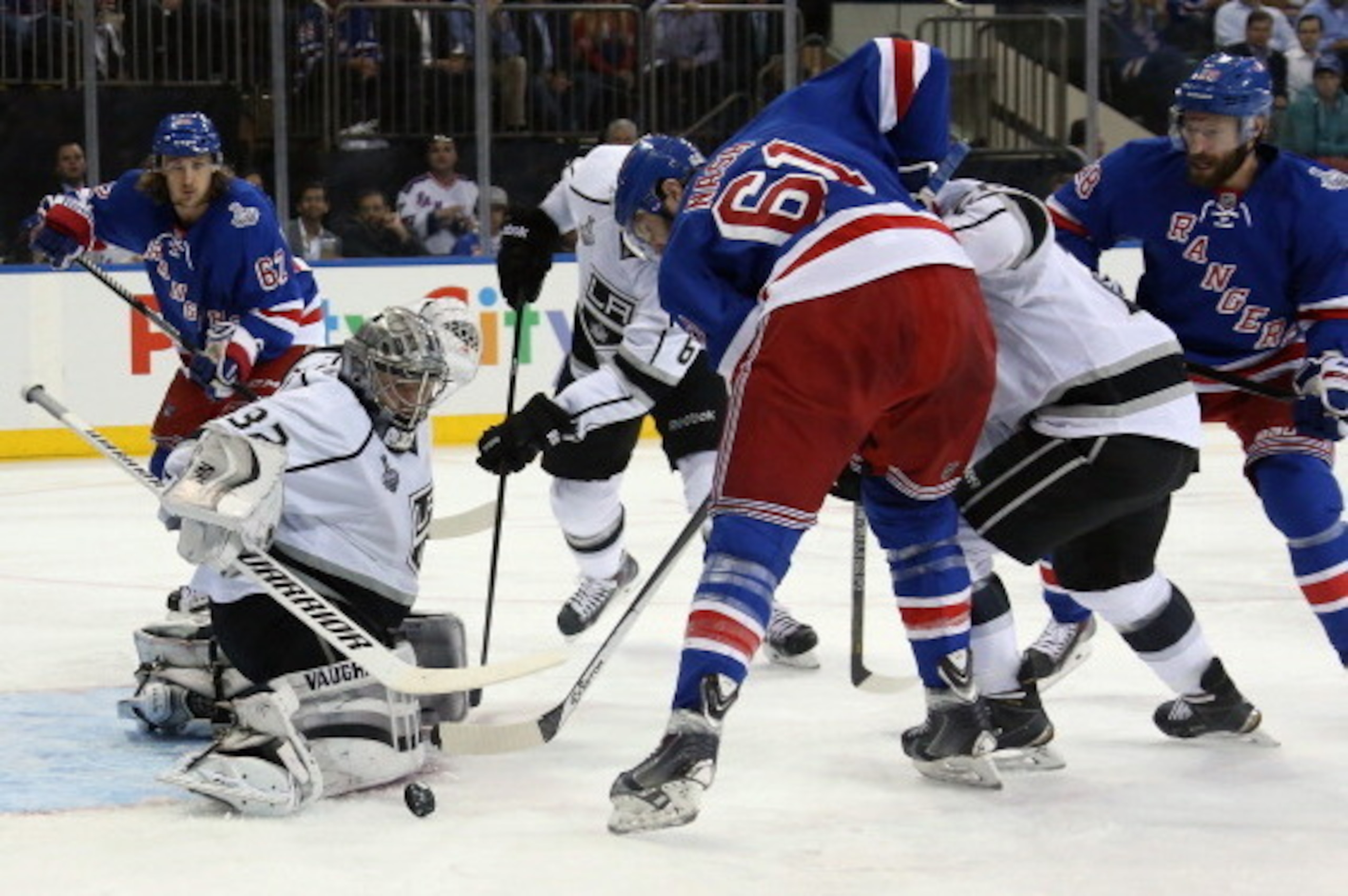 NEW YORK, NY - JUNE 11:  Jonathan Quick #32 of the Los Angeles Kings makes a save on Rick Nash #61 of the New York Rangers during the second period of Game Four of the 2014 NHL Stanley Cup Final at Madison Square Garden on June 11, 2014 in New York, New Y
