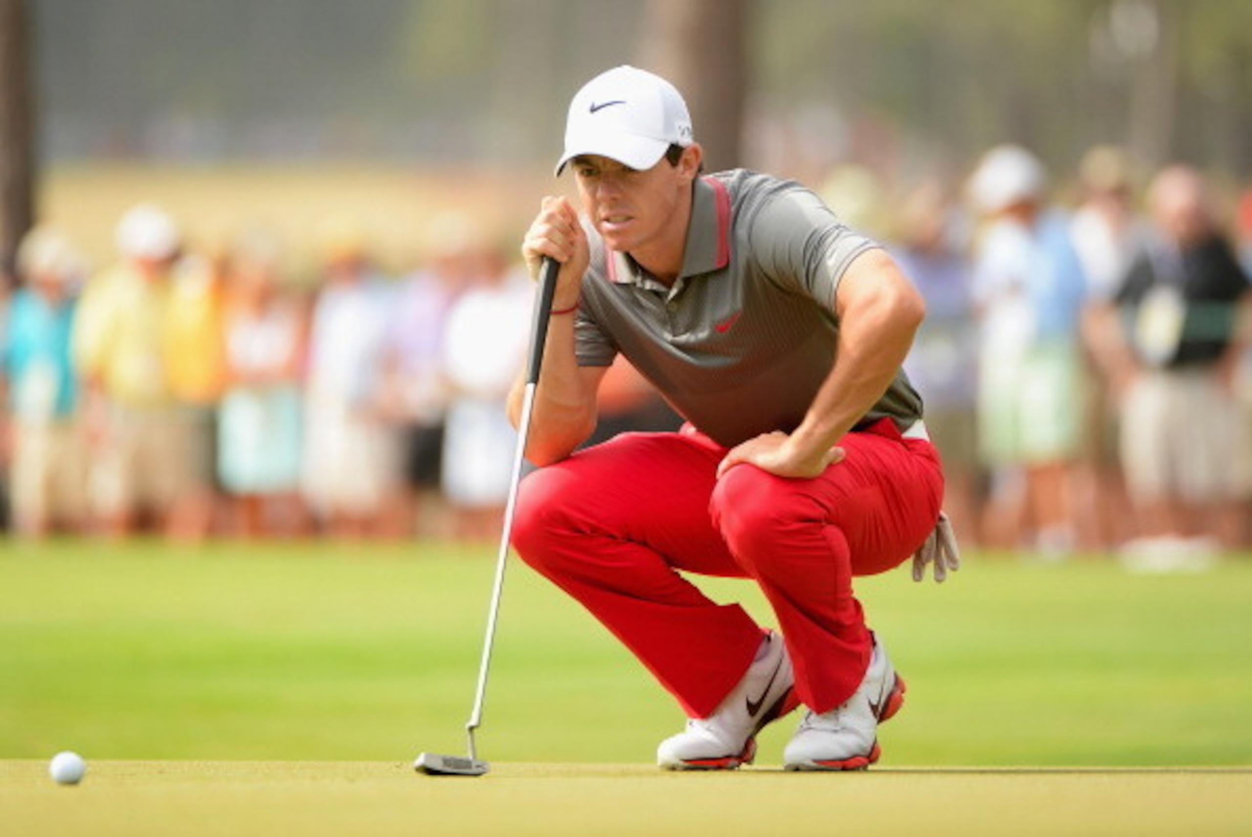 PINEHURST, NC - JUNE 12:  Rory McIlroy of Northern Ireland lines up a putt on the seventh green during the first round of the 114th U.S. Open at Pinehurst Resort & Country Club, Course No. 2 on June 12, 2014 in Pinehurst, North Carolina.  (Photo by Ross K