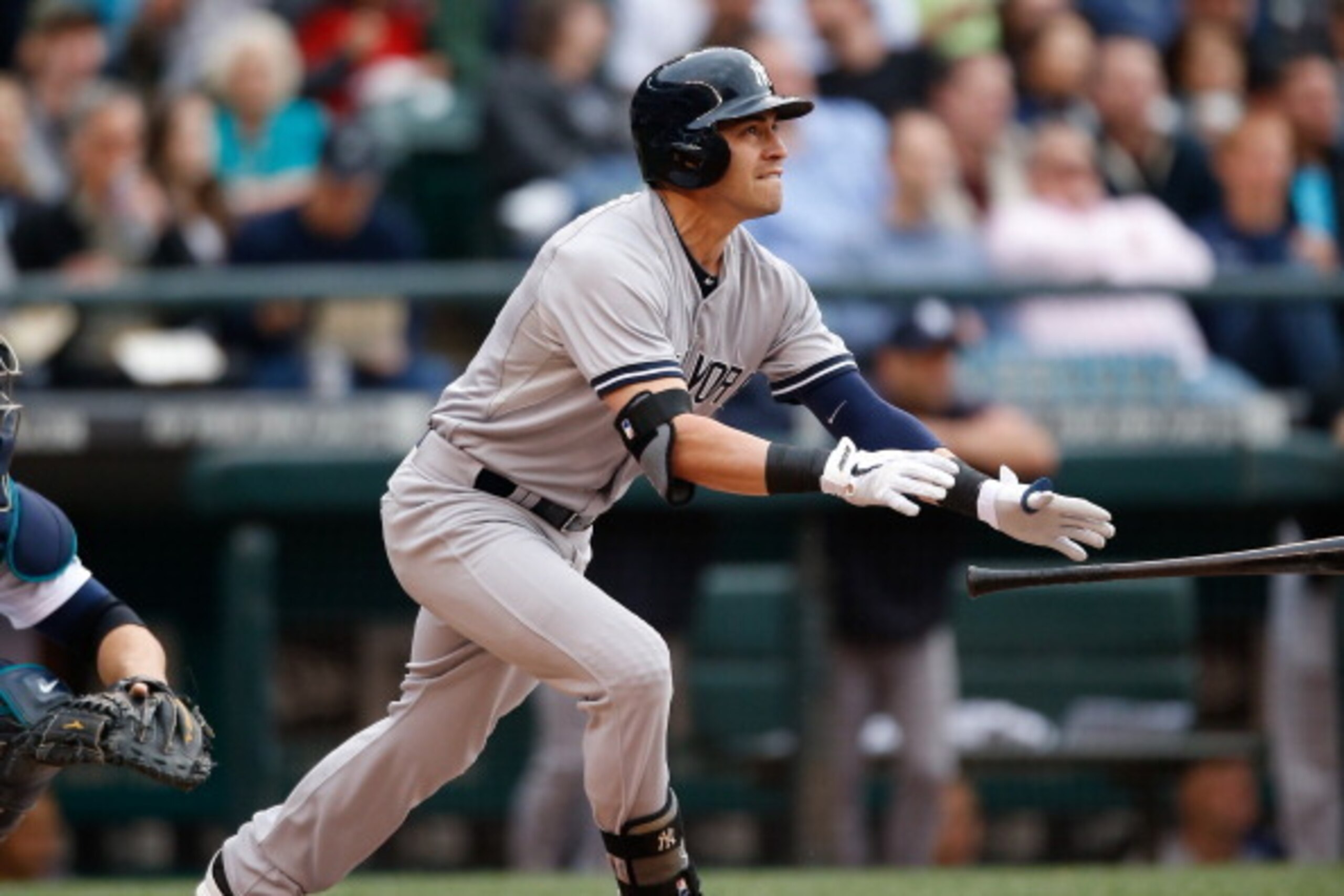 SEATTLE, WA - JUNE 12:  Jacoby Ellsbury #22 of the New York Yankees hits a two-run home run in the first inning against the Seattle Mariners at Safeco Field on June 12, 2014 in Seattle, Washington.  (Photo by Otto Greule Jr/Getty Images)