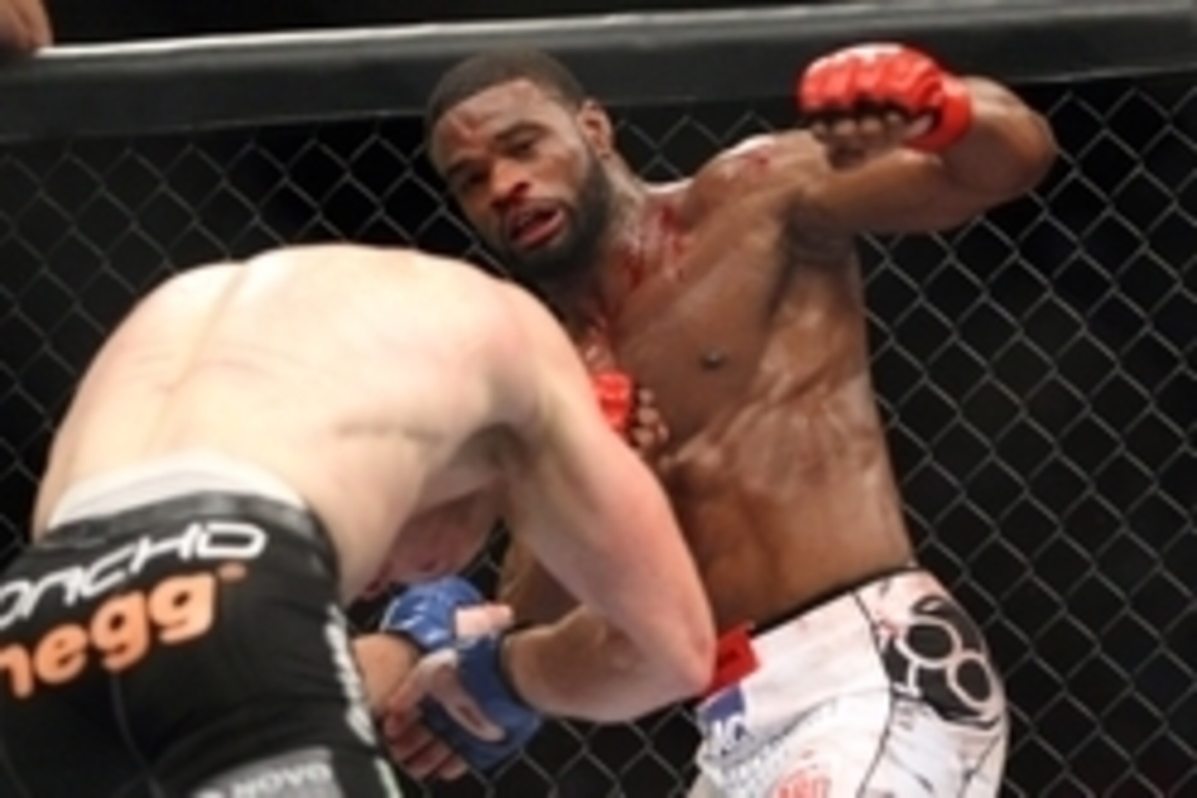 July 14, 2012; Portland, OR, USA; Tyron Woodley (white shorts) fights against Nate Marquardt (black shorts) at MMA Strikeforce at the Rose Garden Arena. Mandatory Credit: Scott Olmos-USA TODAY Sports