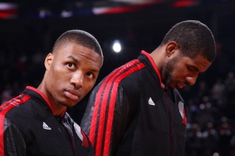 PORTLAND, OR - JANUARY 16:  Damian Lillard #0 and LaMarcus Aldridge #12 of the Portland Trail Blazers stand before the game against the Cleveland Cavaliers on January 16, 2013 at the Rose Garden Arena in Portland, Oregon. NOTE TO USER: User expressly ackn