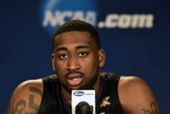 Mar 20, 2014; St. Louis, MO, USA; Kansas State Wildcats forward Thomas Gipson (42) addresses the media at a press conference during their practice session prior to the 2nd round of the 2014 NCAA Men's Basketball Championship at Scottrade Center. Mandatory