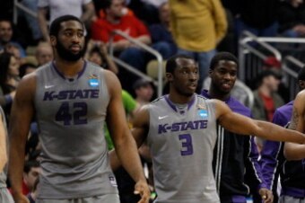 PITTSBURGH, PA - MARCH 15:  Martavious Irving #3 of the Kansas State Wildcats celebrates with teammates Shane Southwell #1 and Jamar Samuels #32 after defeating the Southern Miss Golden Eagles during the second round of the 2012 NCAA Men's Basketball Tour