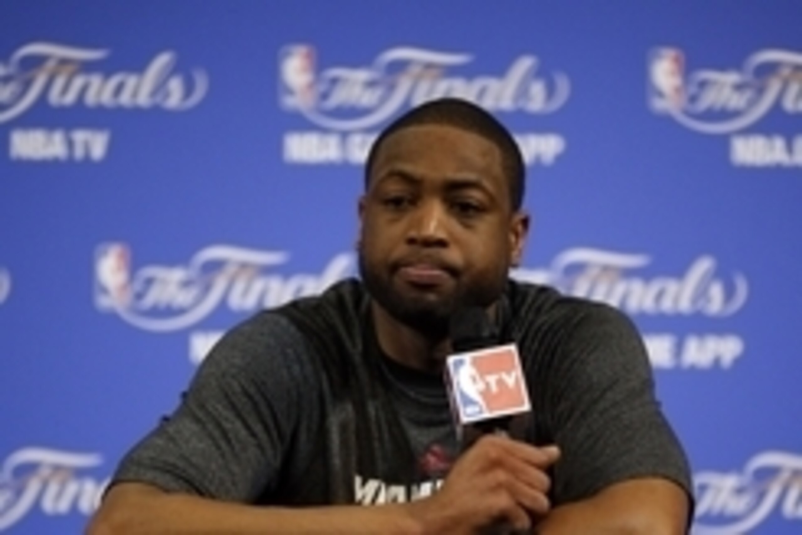 Jun 12, 2014; Miami, FL, USA; Miami Heat guard Dwyane Wade speaks to the media after game four of the 2014 NBA Finals against the San Antonio Spurs at American Airlines Arena. Mandatory Credit: Robert Mayer-USA TODAY Sports