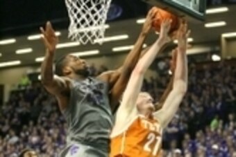 Feb 8, 2014; Manhattan, KS, USA; Texas Longhorns forward Connor Lammert (21) has his shot blocked by Kansas State Wildcats forward Thomas Gipson (42) during the Longhorns' 74-57 loss at Fred Bramlage Coliseum. Mandatory Credit: Scott Sewell-USA TODAY Spor