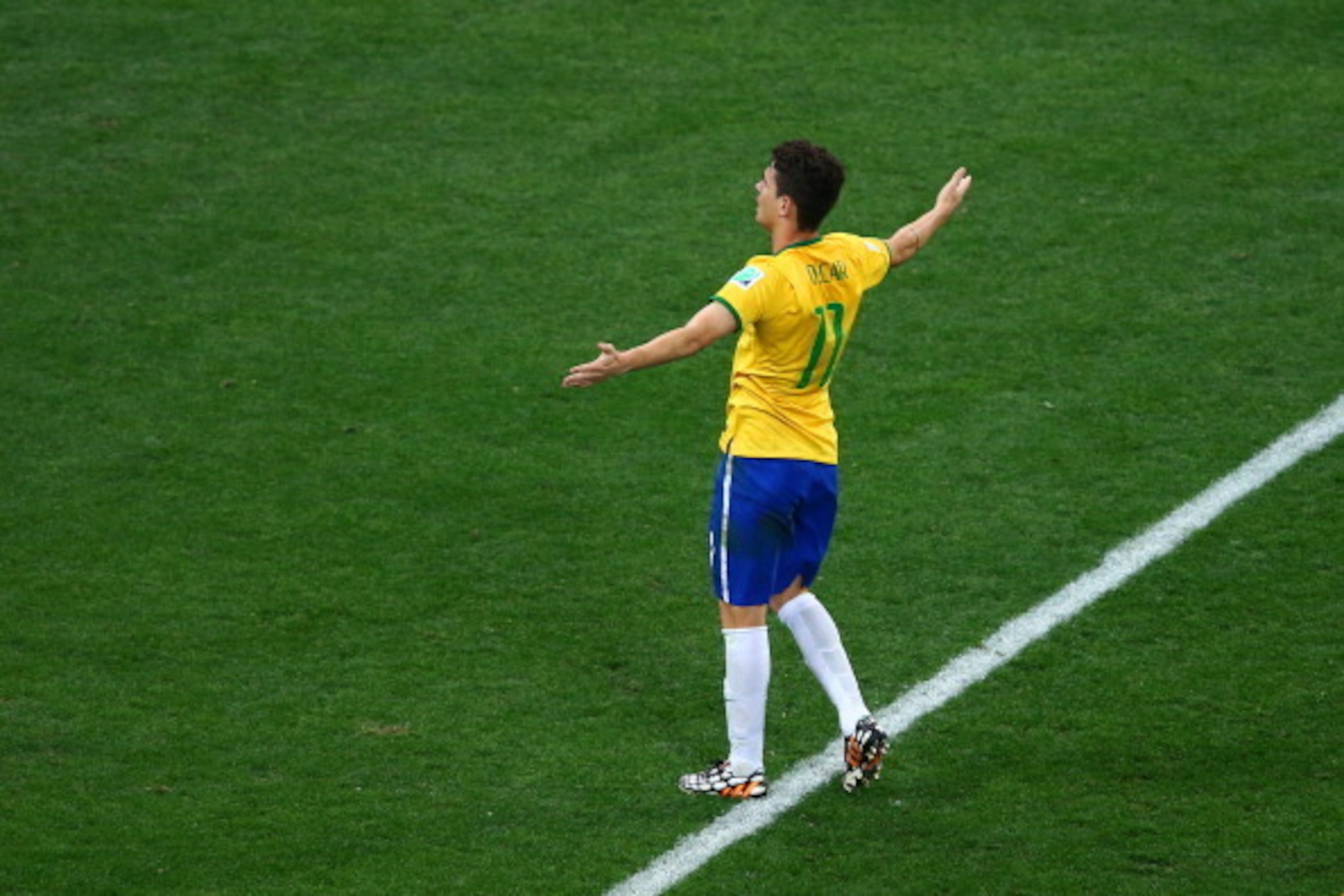 SAO PAULO, BRAZIL - JUNE 12: Oscar of Brazil celebrates his goal in the second half during the 2014 FIFA World Cup Brazil Group A match between Brazil and Croatia at Arena de Sao Paulo on June 12, 2014 in Sao Paulo, Brazil. (Photo by Elsa/Getty Images) SAO PAULO, BRAZIL - JUNE 12: Oscar of Brazil celebrates his goal in the second half during the 2014 FIFA World Cup Brazil Group A match between Brazil and Croatia at Arena de Sao Paulo on June 12, 2014 in Sao Paulo, Brazil. (Photo by Elsa/Getty Images)