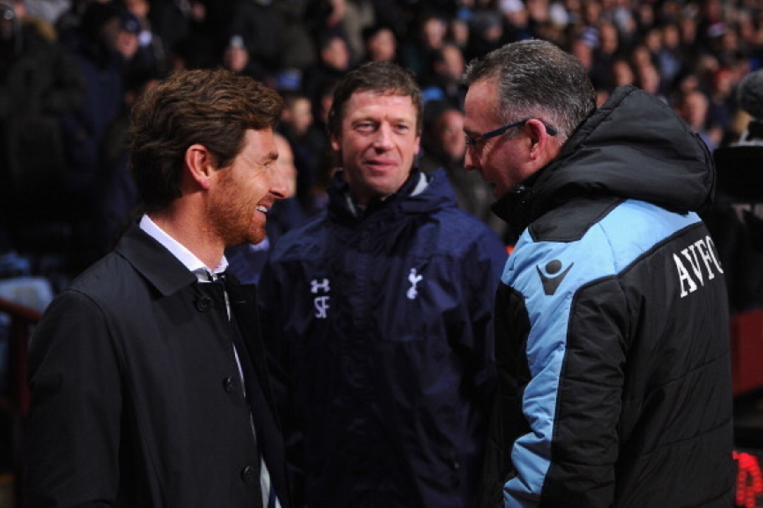 BIRMINGHAM, ENGLAND - DECEMBER 26: Andre Villas-Boas (L), manager of Tottenham Hotspur talks to Paul Lambert (R), manager of Aston Villa with his assistant Steffen Freund during the Barclays Premier League match between Aston Villa and Tottenham Hotspur BIRMINGHAM, ENGLAND - DECEMBER 26: Andre Villas-Boas (L), manager of Tottenham Hotspur talks to Paul Lambert (R), manager of Aston Villa with his assistant Steffen Freund during the Barclays Premier League match between Aston Villa and Tottenham Hotspur