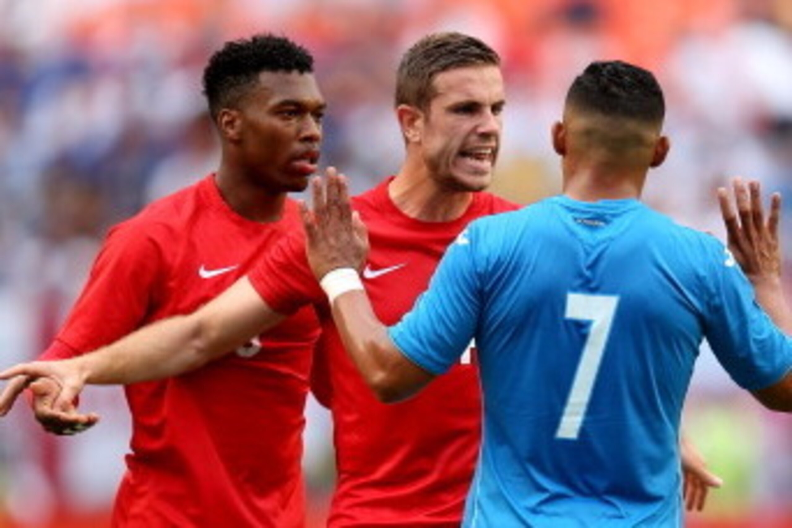 MIAMI GARDENS, FL - JUNE 07: Jordan Henderson of England (C) speaks to Emilio Izaguirre of Honduras as Daniel Sturridge (L) looks on during the International Friendly match between England and Honduras at the Sun Life Stadium on June 7, 2014 in Miami Gar MIAMI GARDENS, FL - JUNE 07: Jordan Henderson of England (C) speaks to Emilio Izaguirre of Honduras as Daniel Sturridge (L) looks on during the International Friendly match between England and Honduras at the Sun Life Stadium on June 7, 2014 in Miami Gar