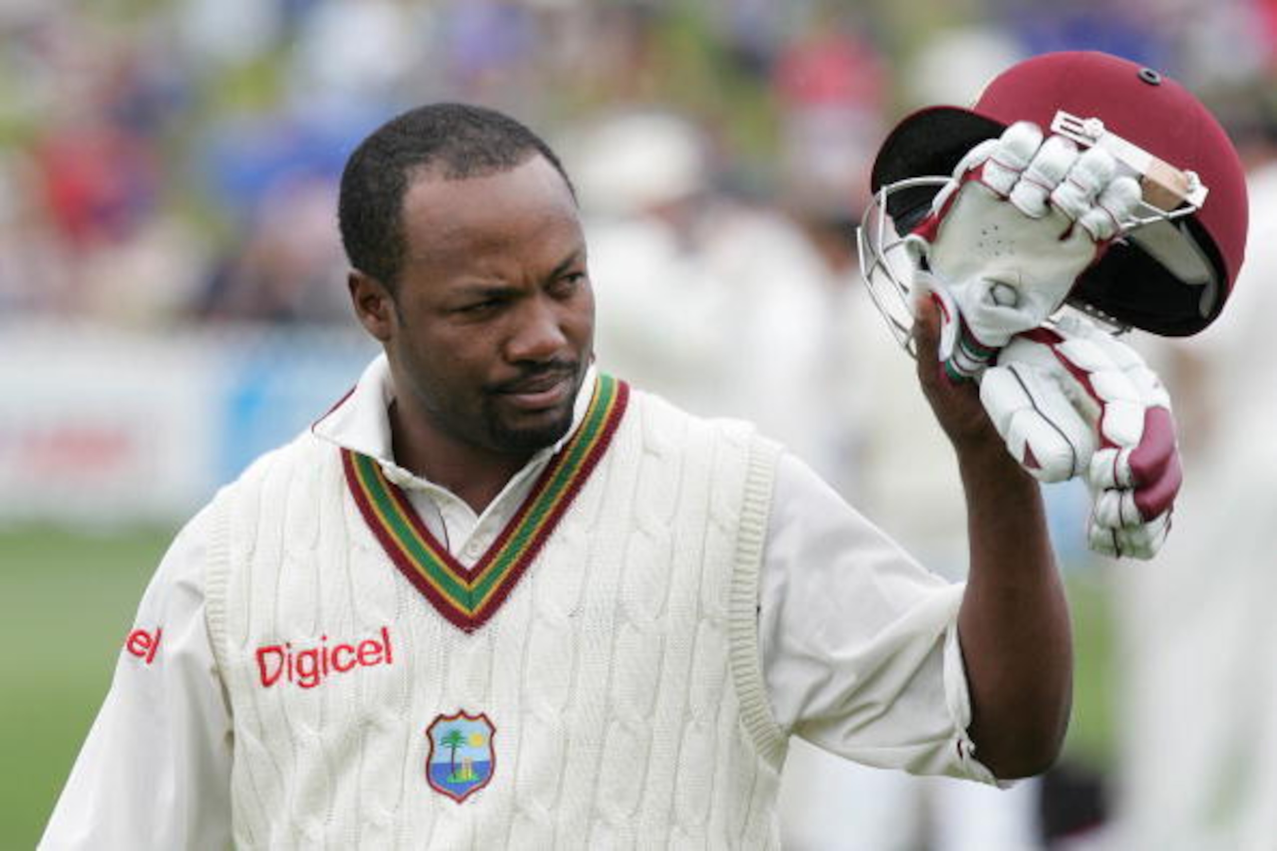 WELLINGTON, NEW ZEALAND - MARCH 19: Brian Lara of the West Indies lifts his cap to the crowd as he leaves the field after being caught out for one run by Hamish Marshall of the New Zealand BlackCaps during day three of the second test match between New Ze