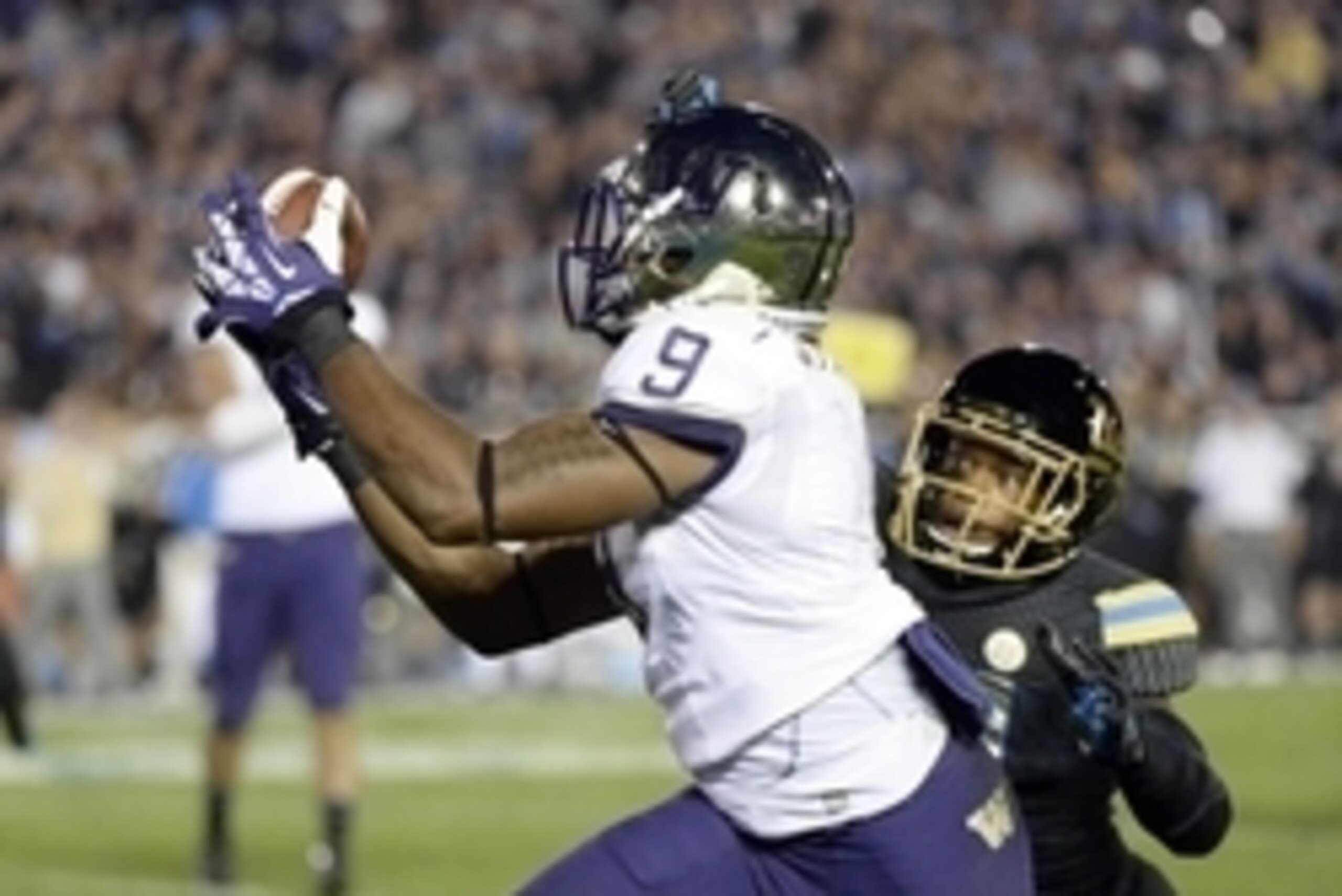 Nov 15, 2013; Pasadena, CA, USA; Washington Huskies wide receiver Damore'ea Stringfellow (9) catches a pass against UCLA Bruins cornerback Ishmael Adams (24) during the game at the Rose Bowl. Mandatory Credit: Richard Mackson-USA TODAY Sports Nov 15, 2013; Pasadena, CA, USA; Washington Huskies wide receiver Damore'ea Stringfellow (9) catches a pass against UCLA Bruins cornerback Ishmael Adams (24) during the game at the Rose Bowl. Mandatory Credit: Richard Mackson-USA TODAY Sports