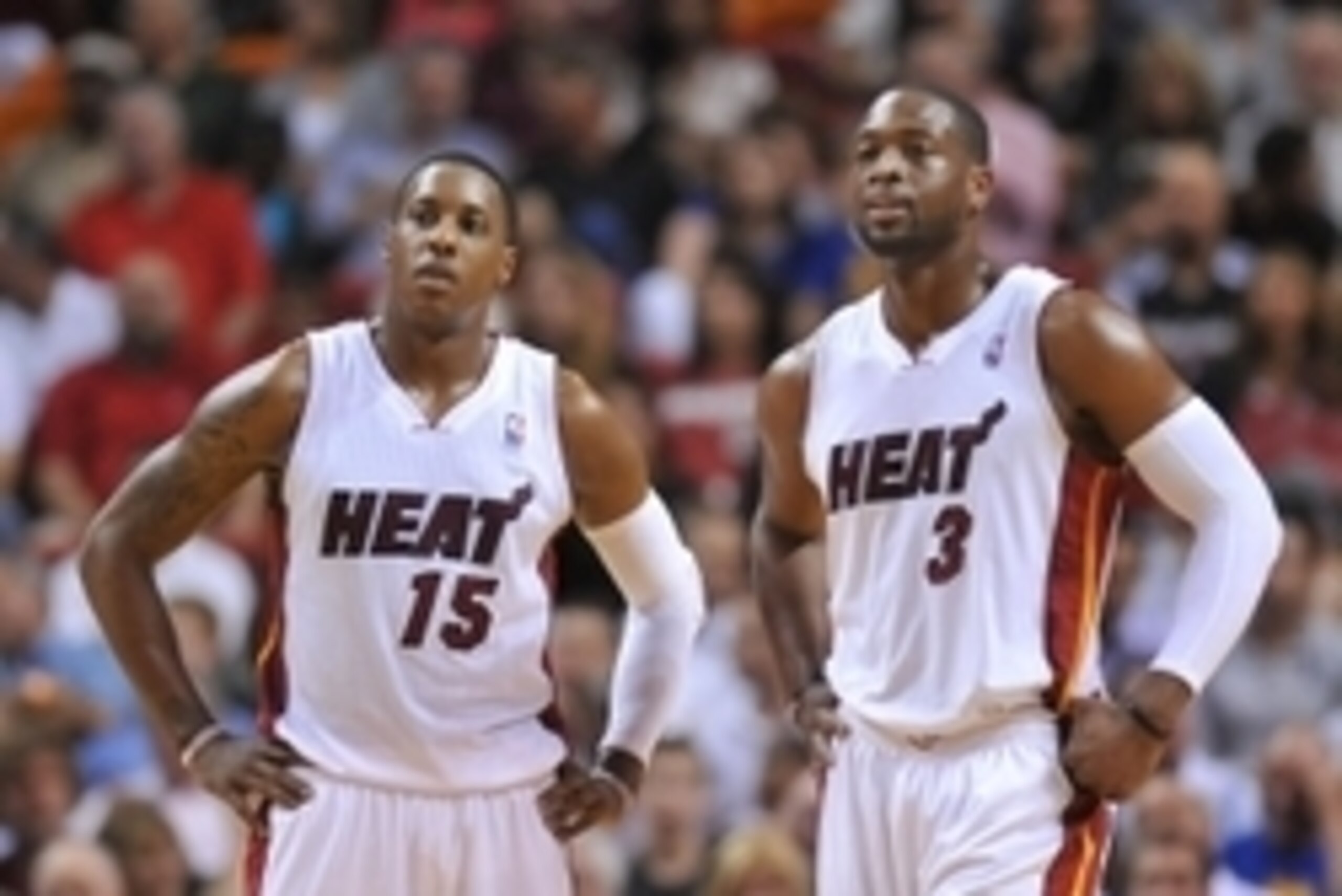 Jan 2, 2014; Miami, FL, USA; Miami Heat point guard Mario Chalmers (left) chats with shooting guard Dwyane Wade (right) during the second half against the Golden State Warriors at American Airlines Arena. Mandatory Credit: Steve Mitchell-USA TODAY Sports Jan 2, 2014; Miami, FL, USA; Miami Heat point guard Mario Chalmers (left) chats with shooting guard Dwyane Wade (right) during the second half against the Golden State Warriors at American Airlines Arena. Mandatory Credit: Steve Mitchell-USA TODAY Sports