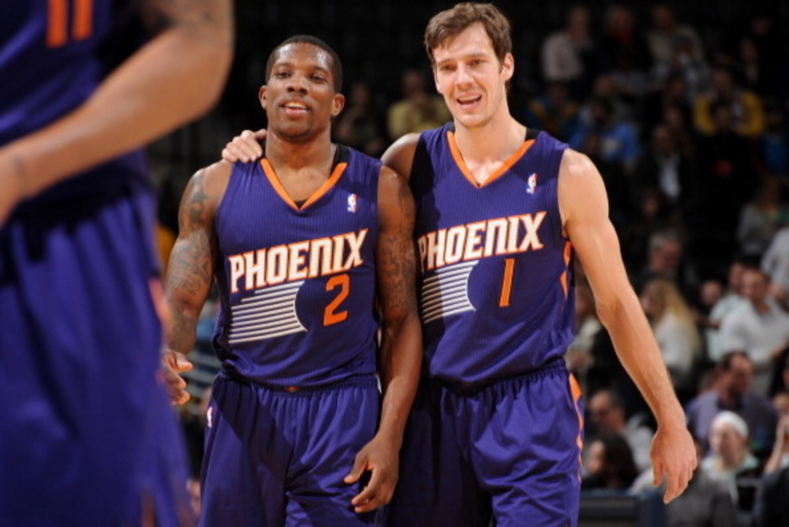 DENVER, CO - December 20:  Eric Bledsoe #2 and Goran Dragic #1 of the Phoenix Suns smile and walk off the court against the Denver Nuggets on December 20, 2013 at the Pepsi Center in Denver, Colorado. NOTE TO USER: User expressly acknowledges and agrees t