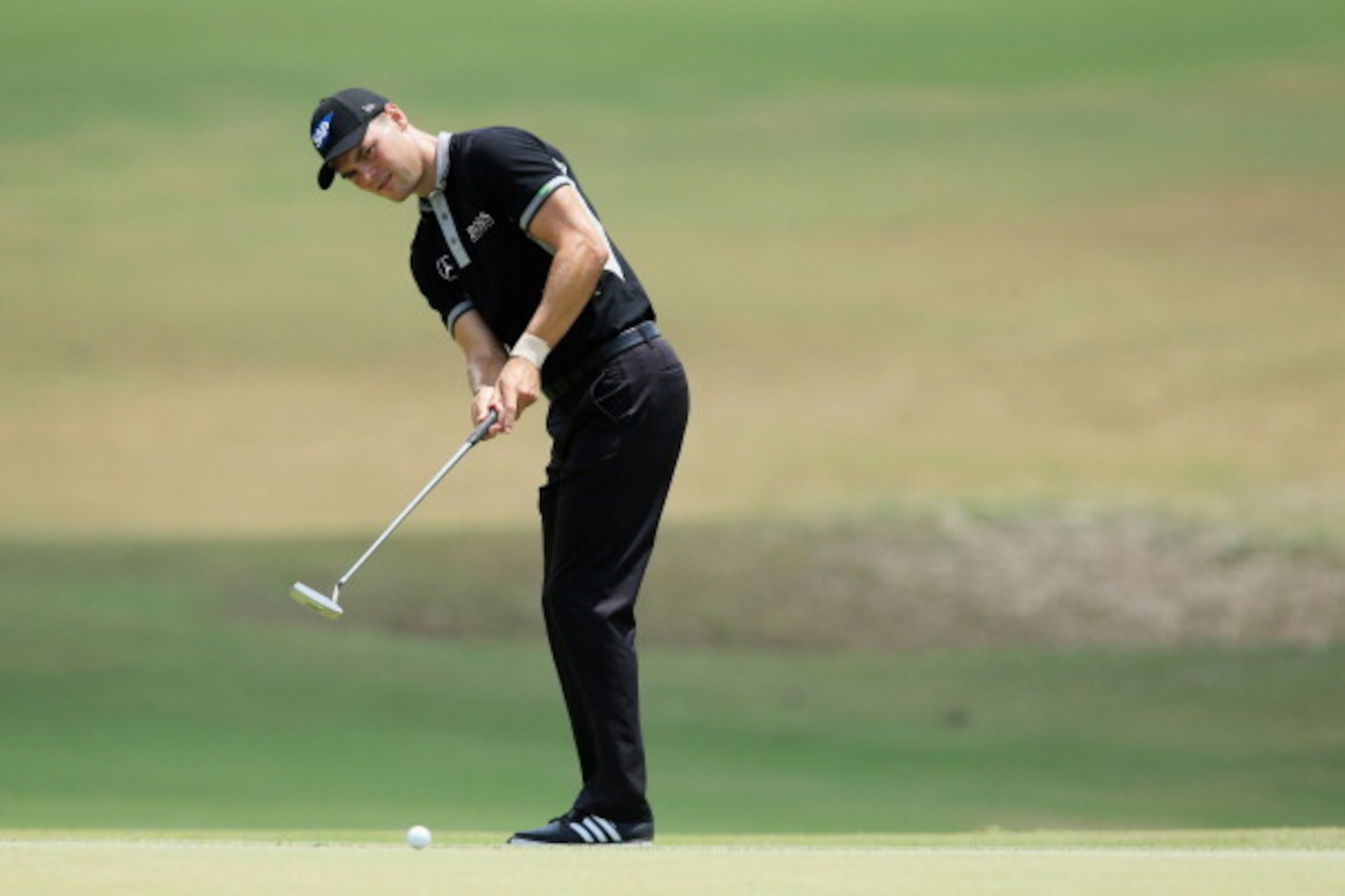 PINEHURST, NC - JUNE 13:  Martin Kaymer of Germany putts on the fifth hole during the second round of the 114th U.S. Open at Pinehurst Resort & Country Club, Course No. 2 on June 13, 2014 in Pinehurst, North Carolina.  (Photo by David Cannon/Getty Images)