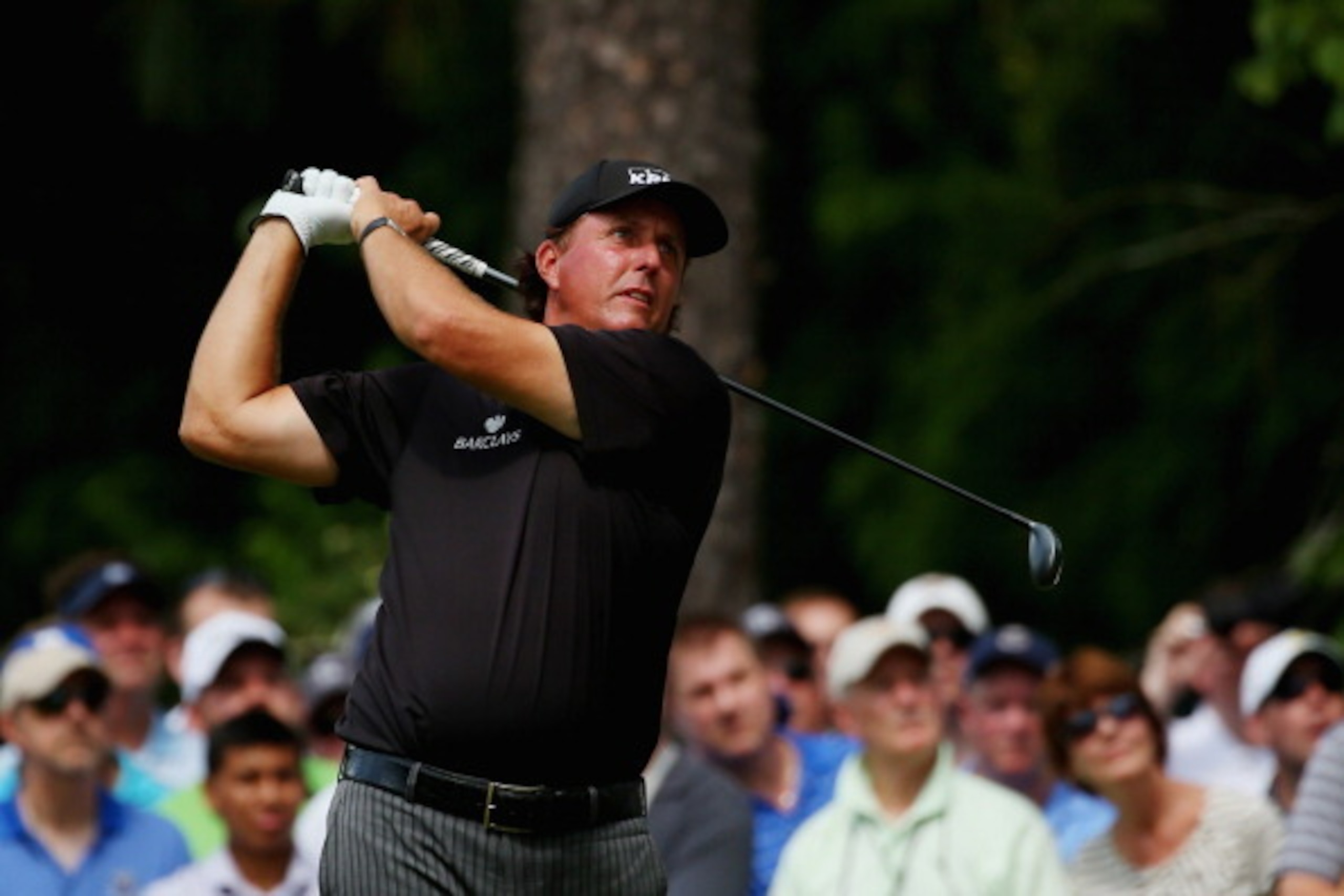 PINEHURST, NC - JUNE 12:  Phil Mickelson of the United States watches his tee shot on the third hole during the first round of the 114th U.S. Open at Pinehurst Resort & Country Club, Course No. 2 on June 12, 2014 in Pinehurst, North Carolina.  (Photo by M