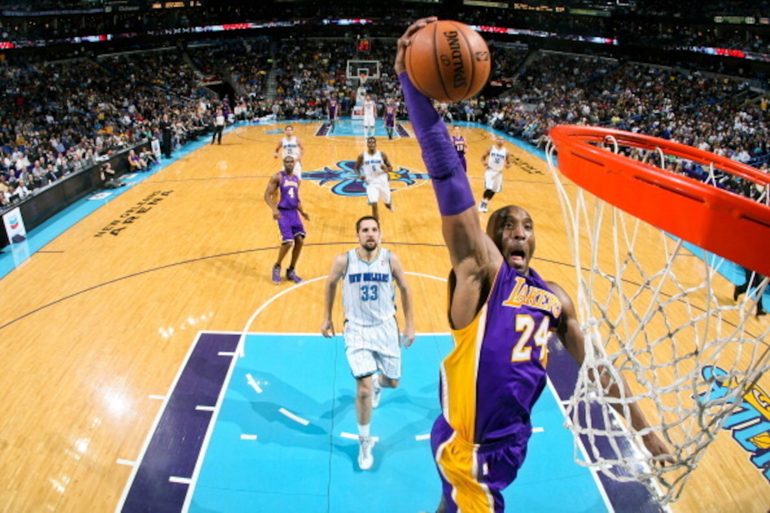 NEW ORLEANS, LA - MARCH 6: Kobe Bryant #24 of the Los Angeles Lakers dunks on a fast break against the New Orleans Hornets on March 6, 2013 at the New Orleans Arena in New Orleans, Louisiana. NOTE TO USER: User expressly acknowledges and agrees that, by d